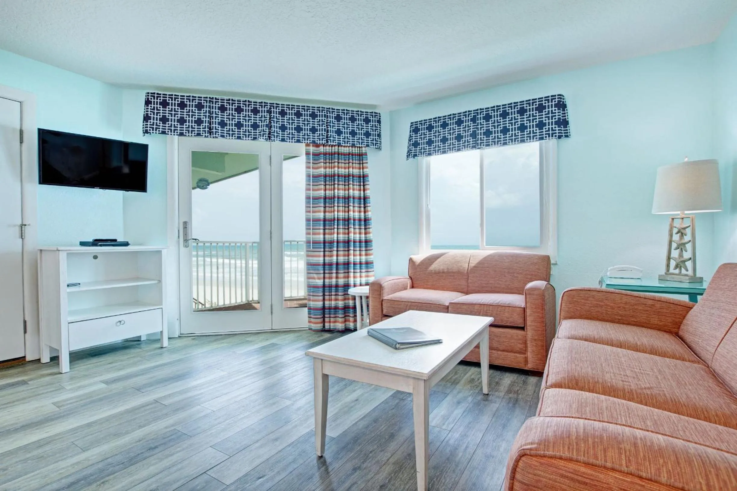 Living room in New Smyrna Waves by Exploria Resorts