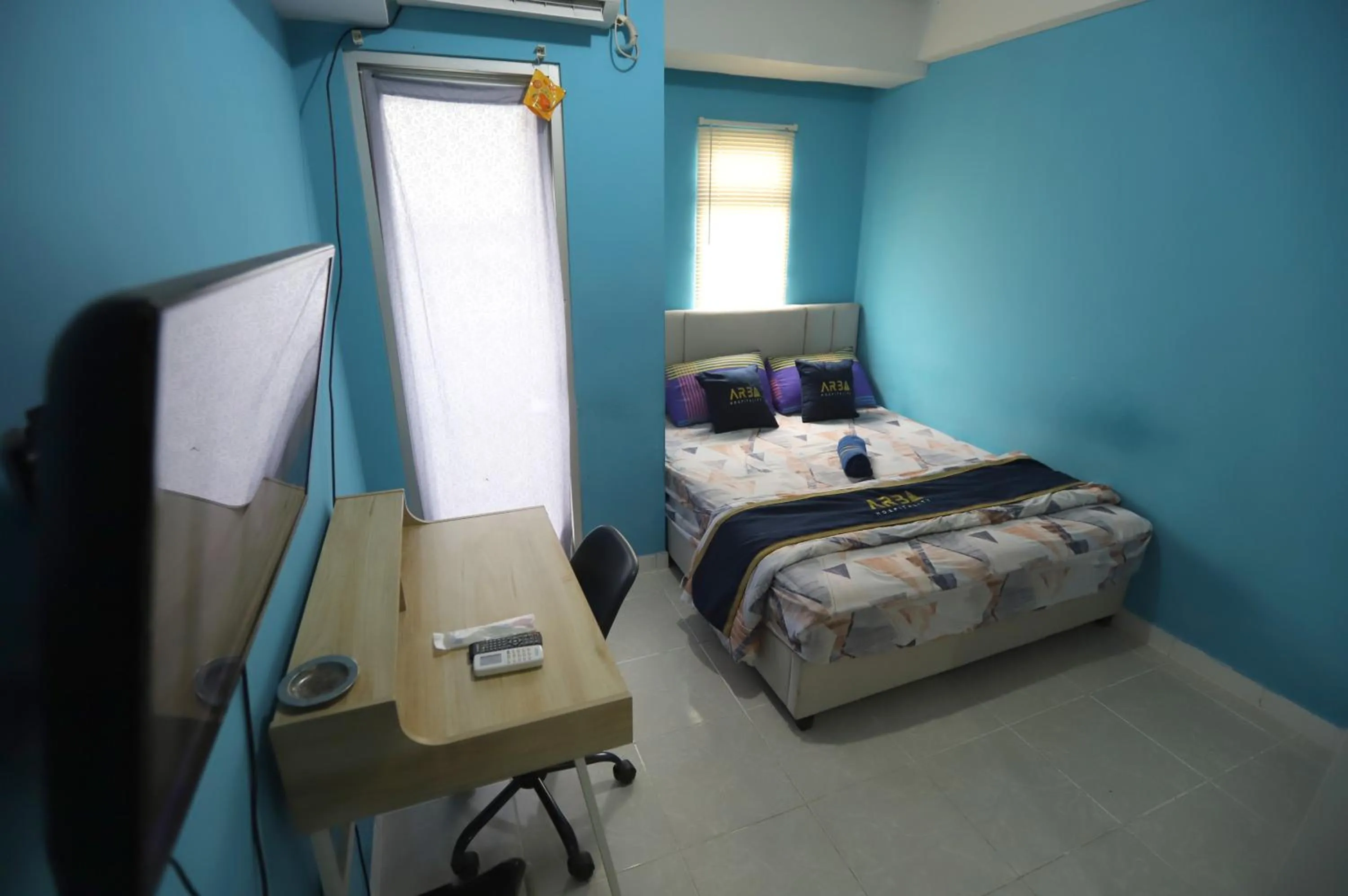 Bed in ARBA Dramaga Tower by Rendirooms