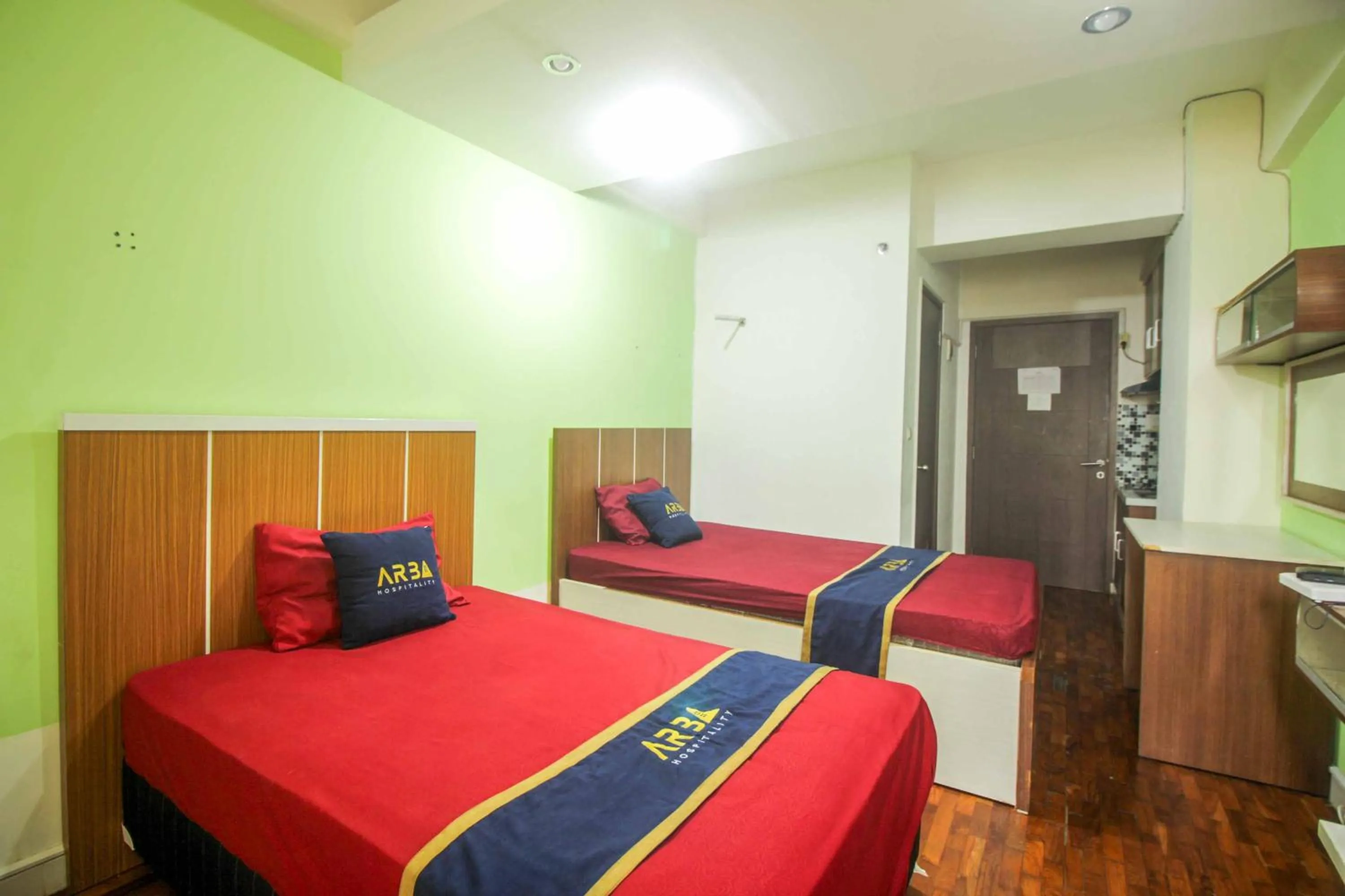 Bed in ARBA Dramaga Tower by Rendirooms