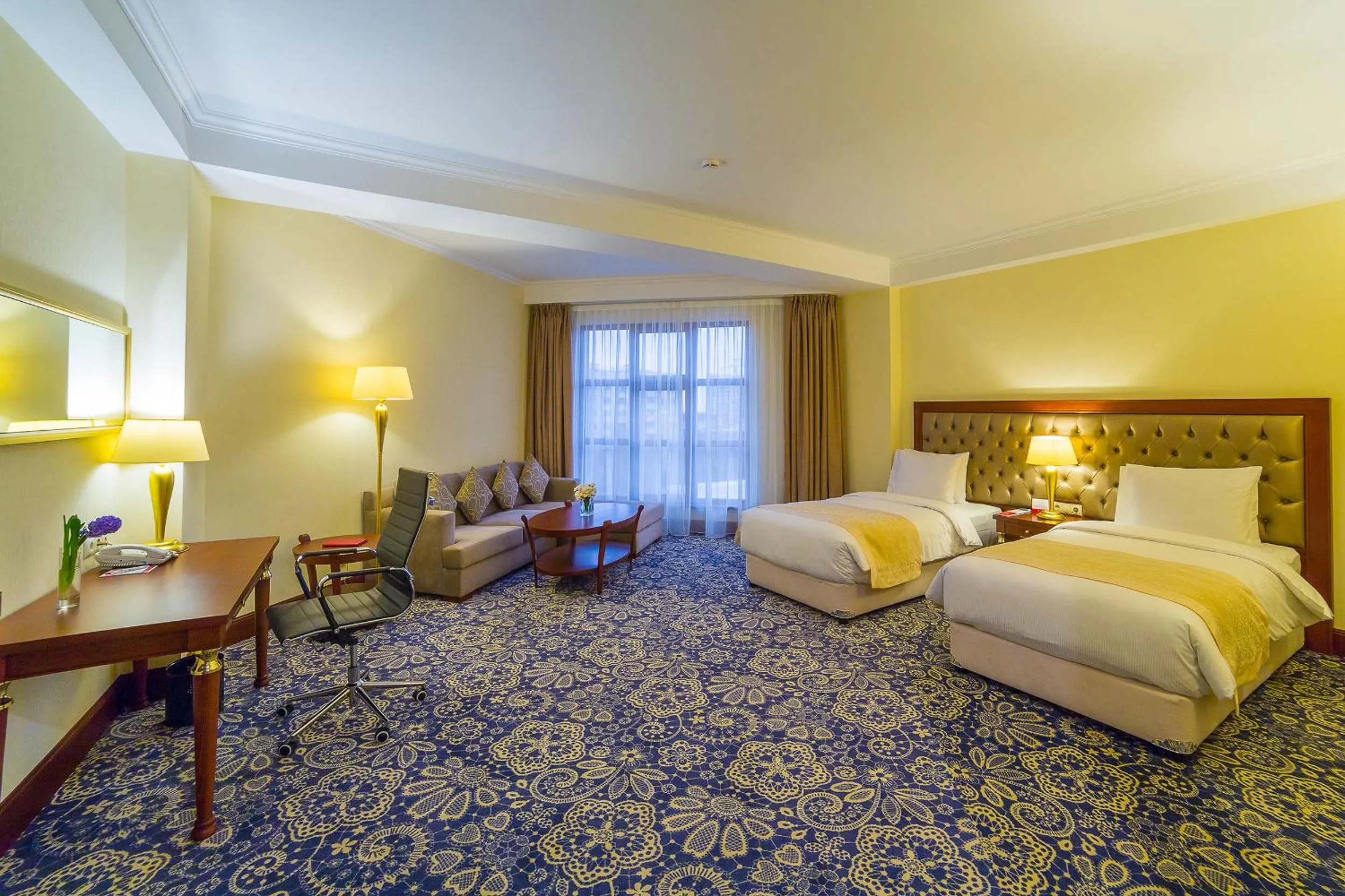 Bed in Ramada by Wyndham Almaty