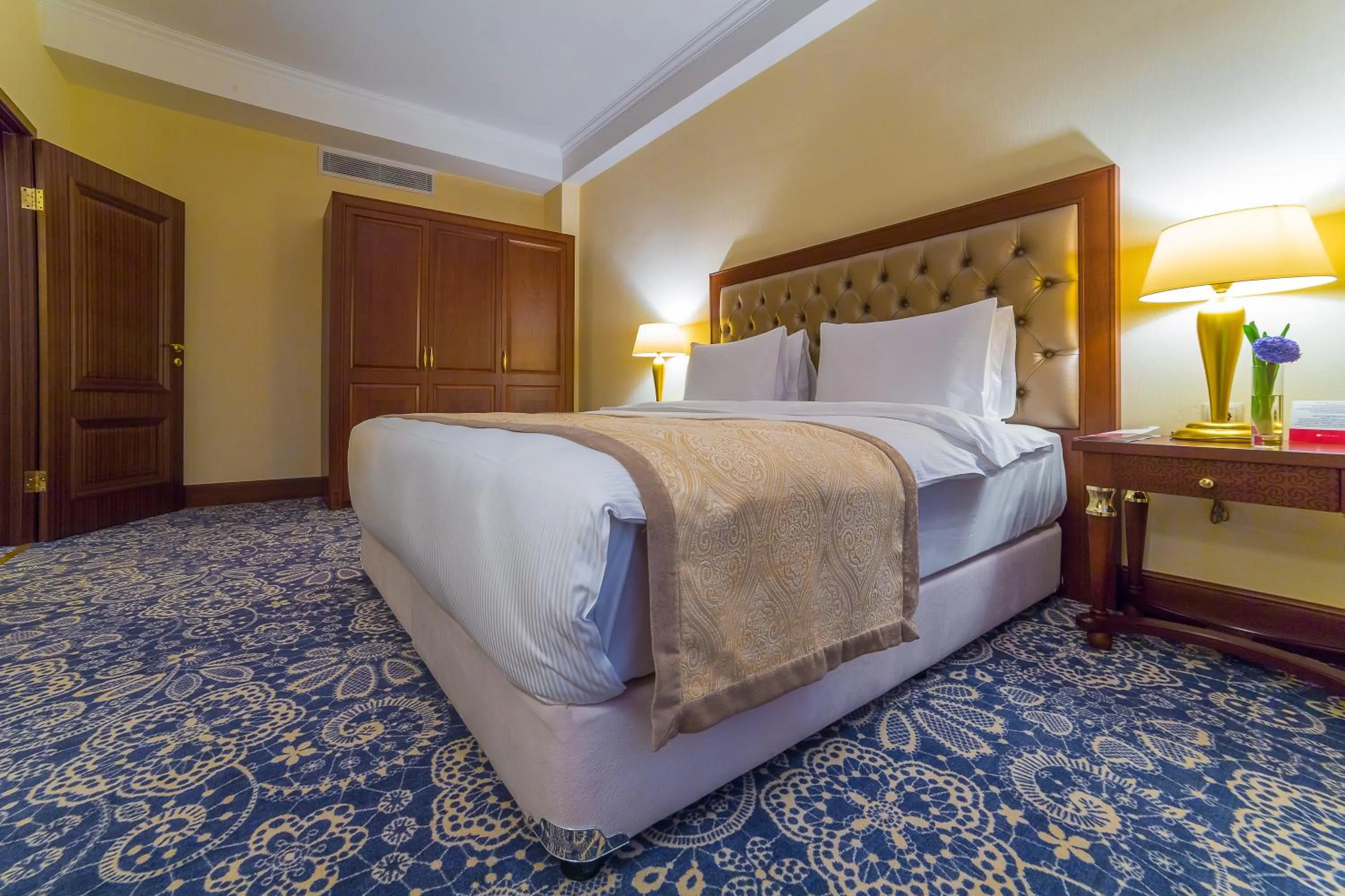 Bed in Ramada by Wyndham Almaty