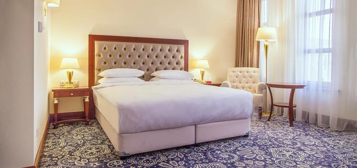 Bed in Ramada by Wyndham Almaty