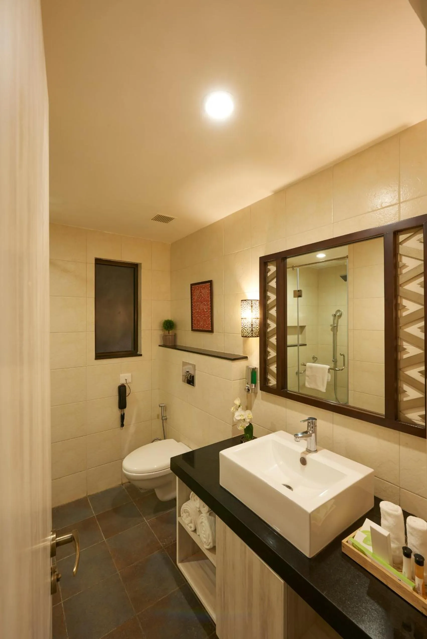 Bathroom in Club Mahindra Kanha