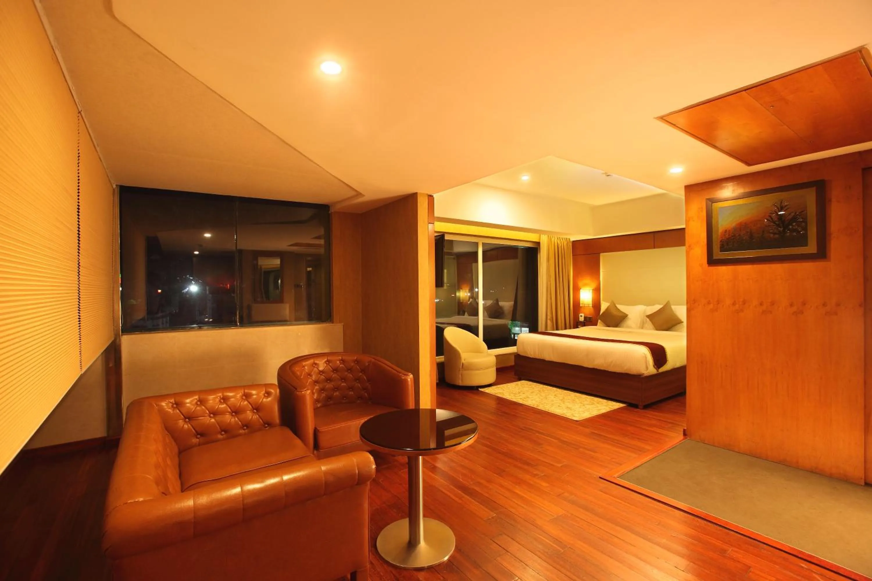 Bed in The Garuda Hotels