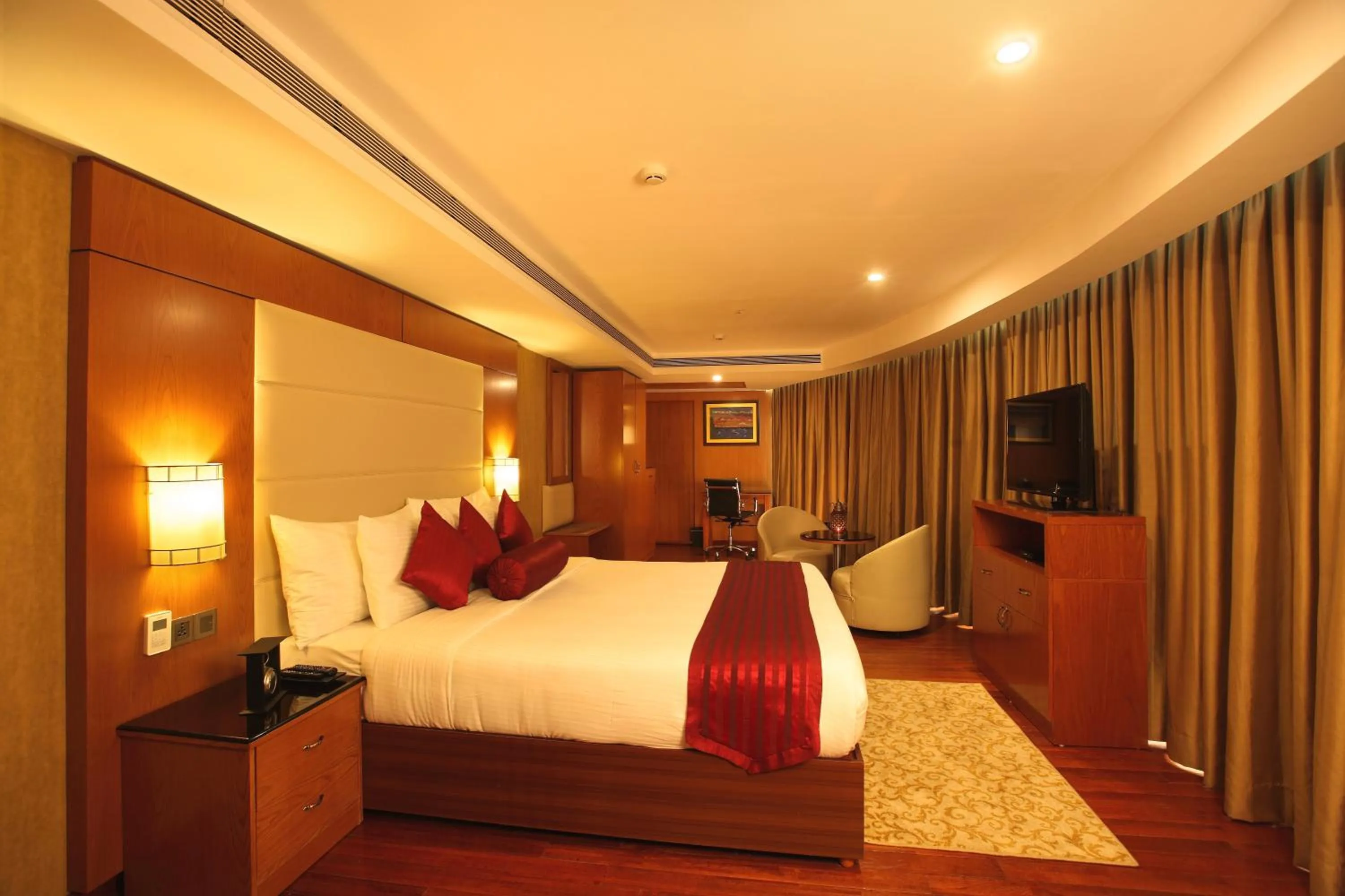 Bed in The Garuda Hotels