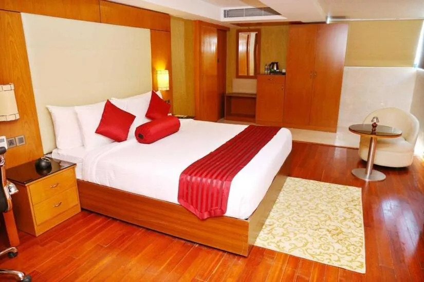 Bed in The Garuda Hotels