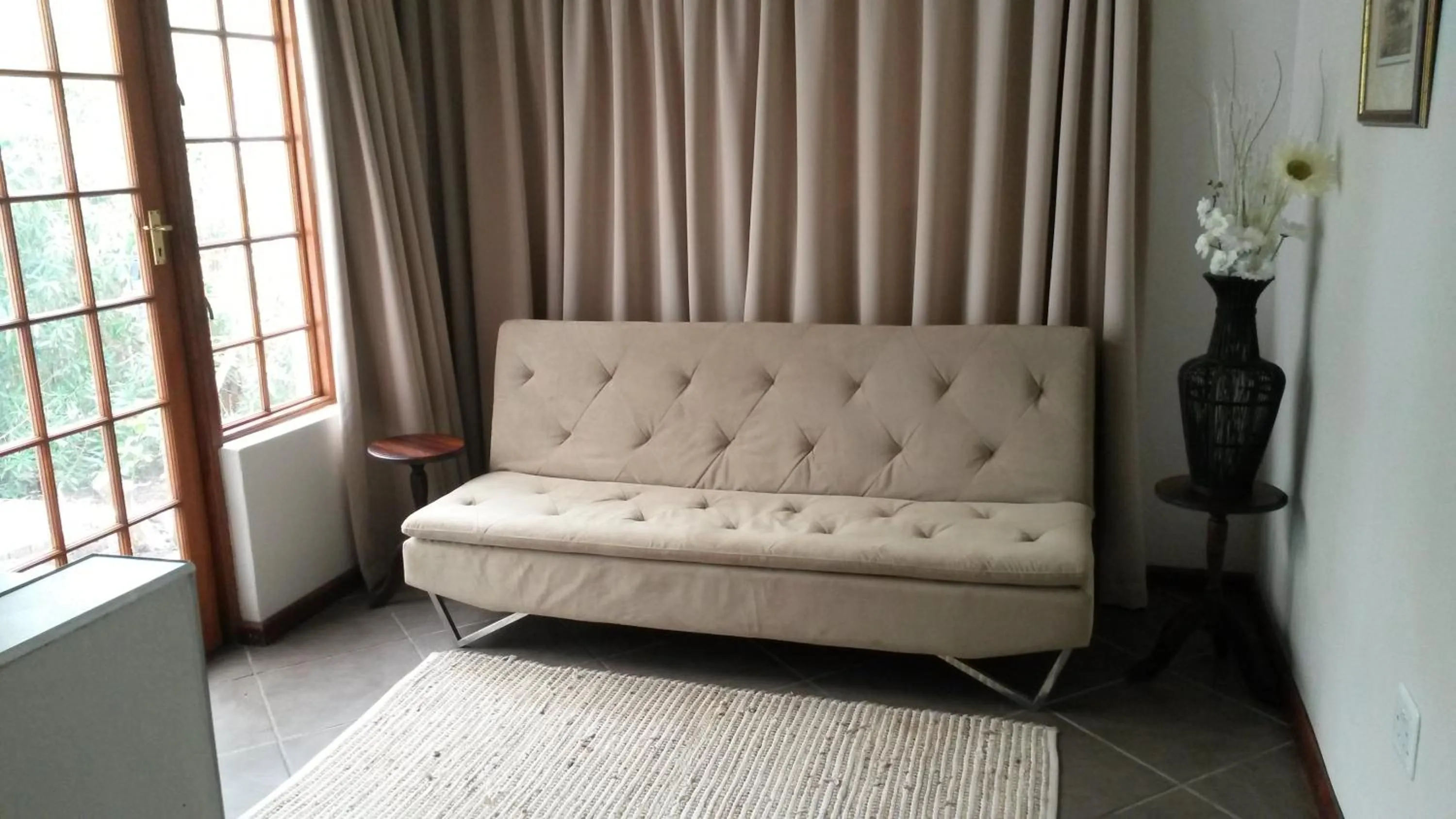 Living room in Queen Manor Boutique Guest House