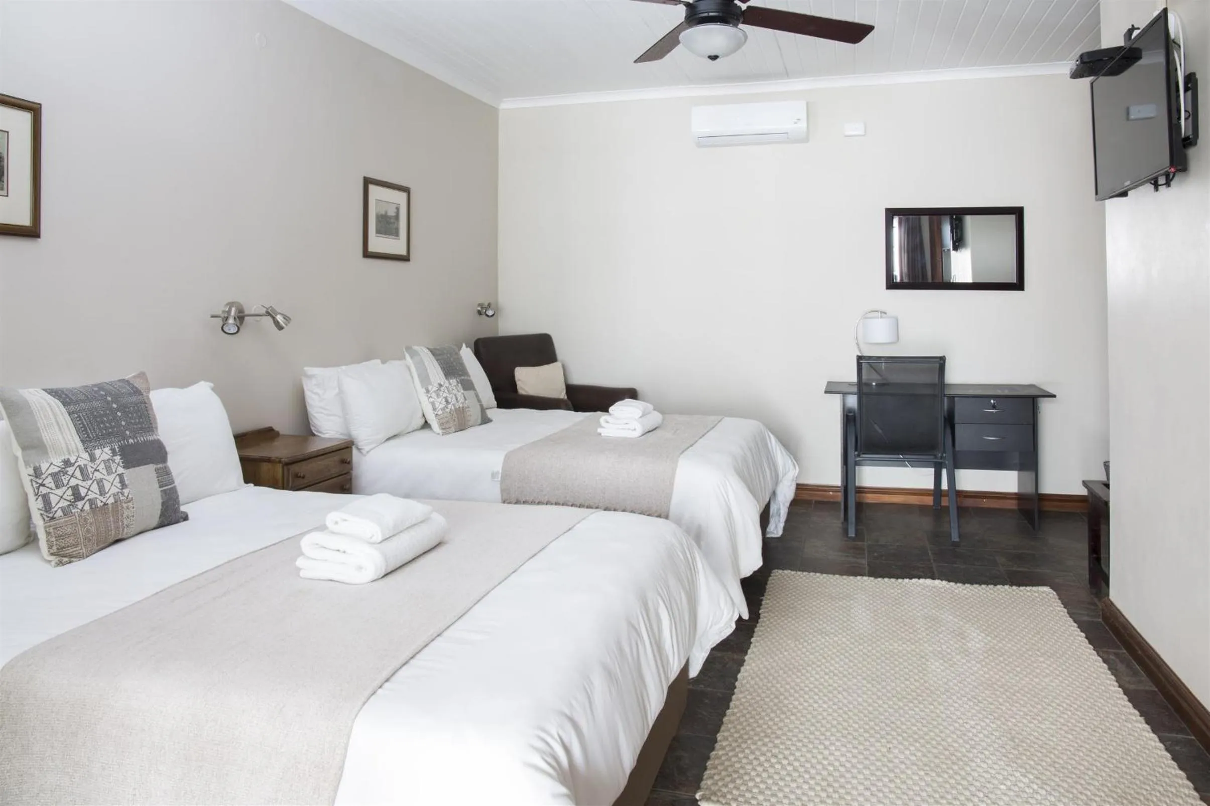 Bed in Queen Manor Boutique Guest House