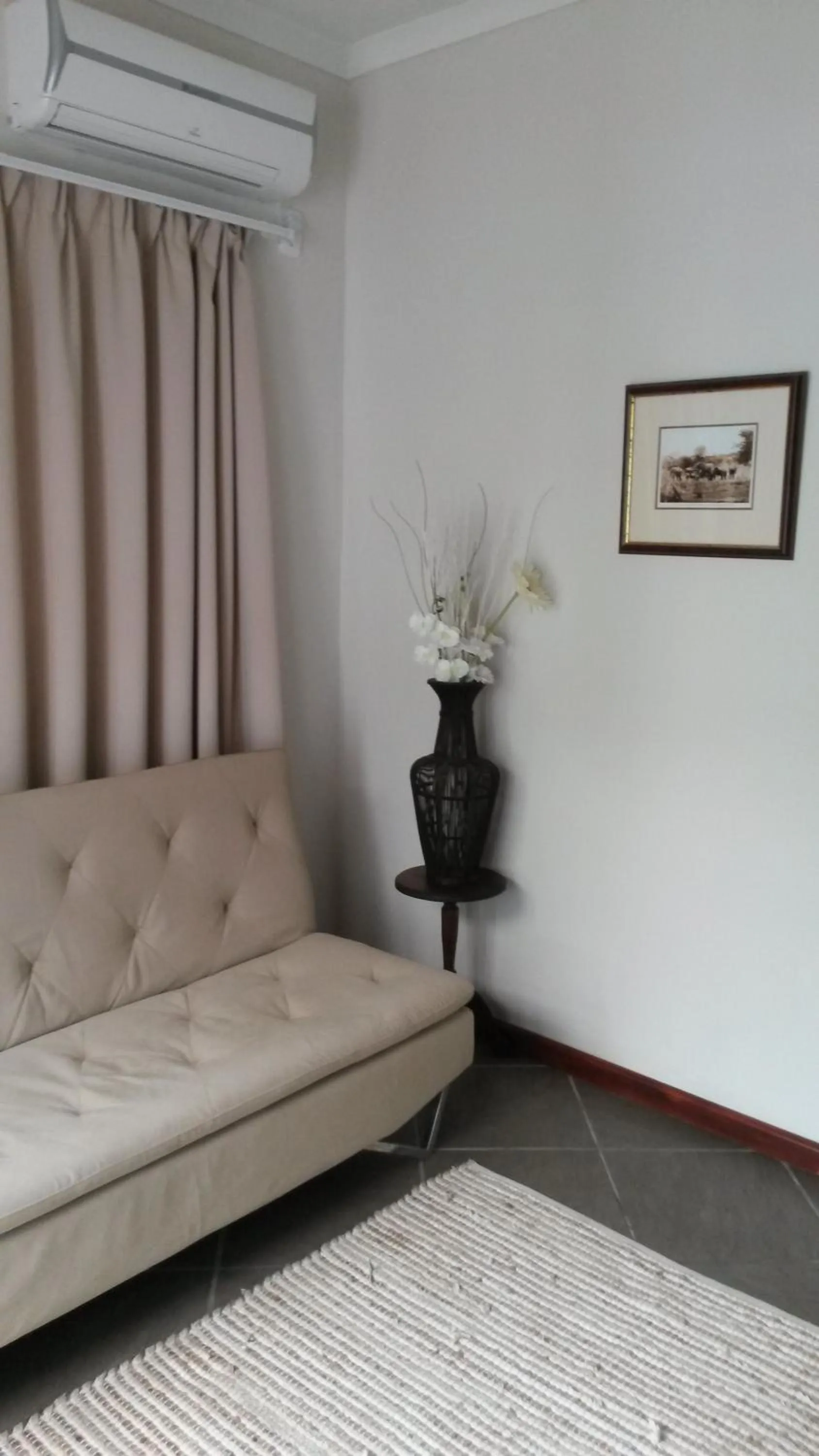 Living room in Queen Manor Boutique Guest House