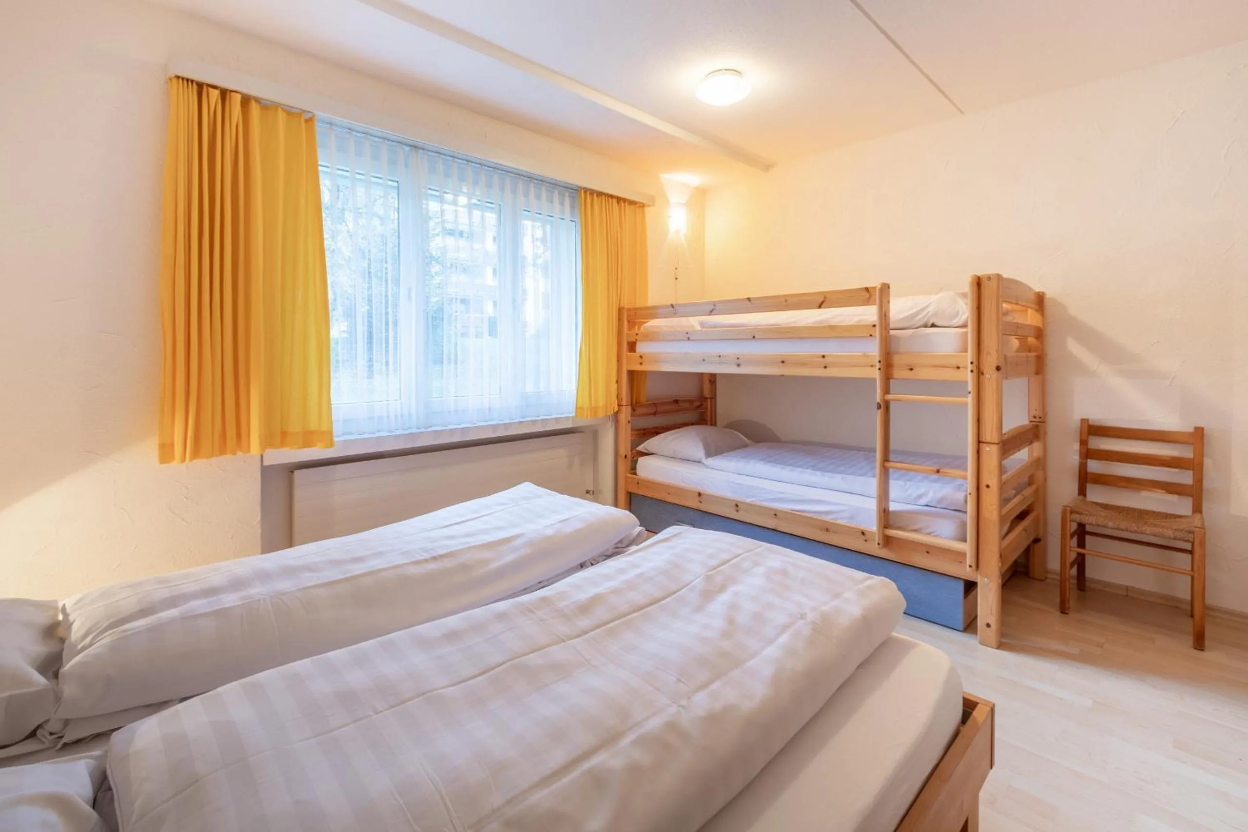 Bed in LAAX Homes Val Signina 3-5