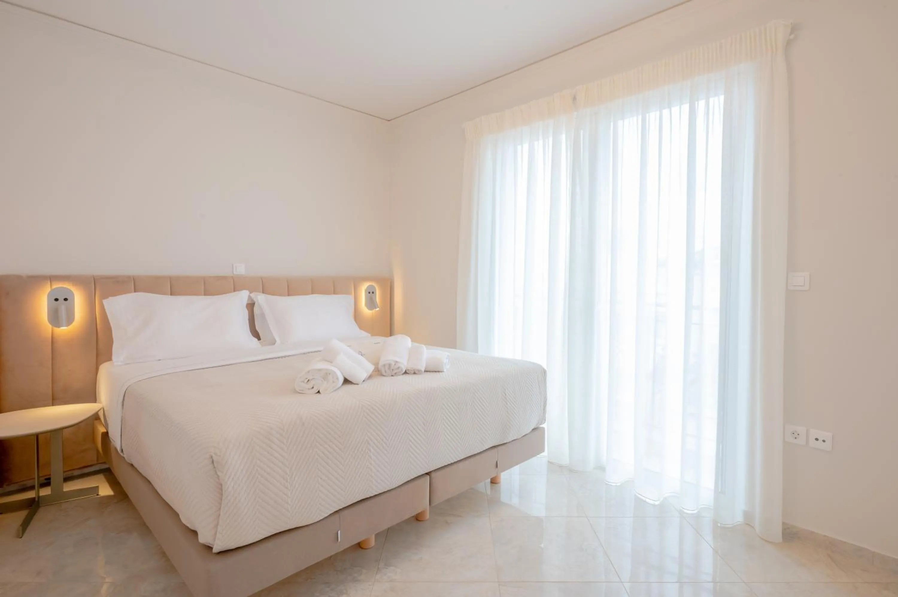 Bed in Apeiron Athena Residences