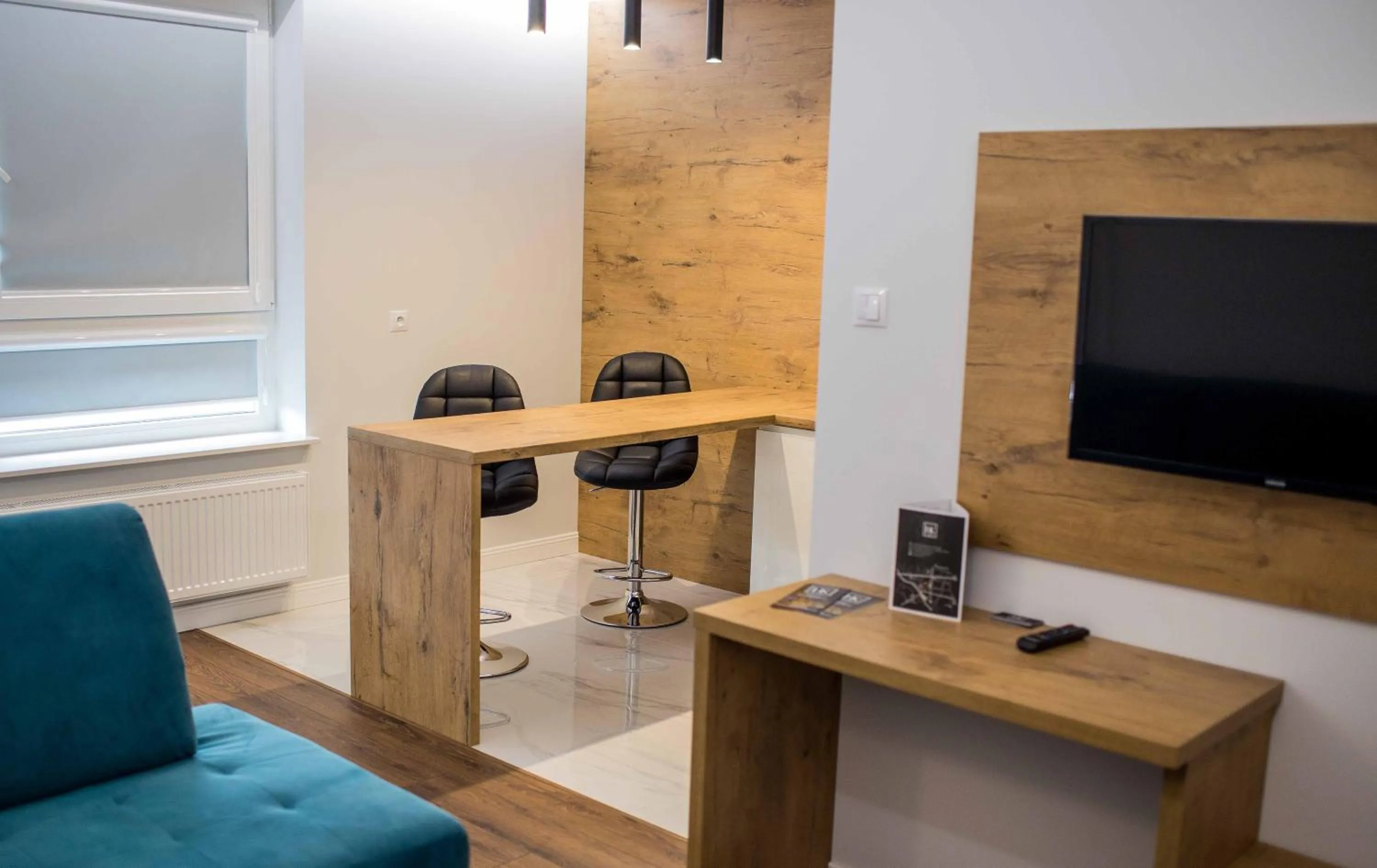 Communal lounge/ TV room in Hotel Kamienica