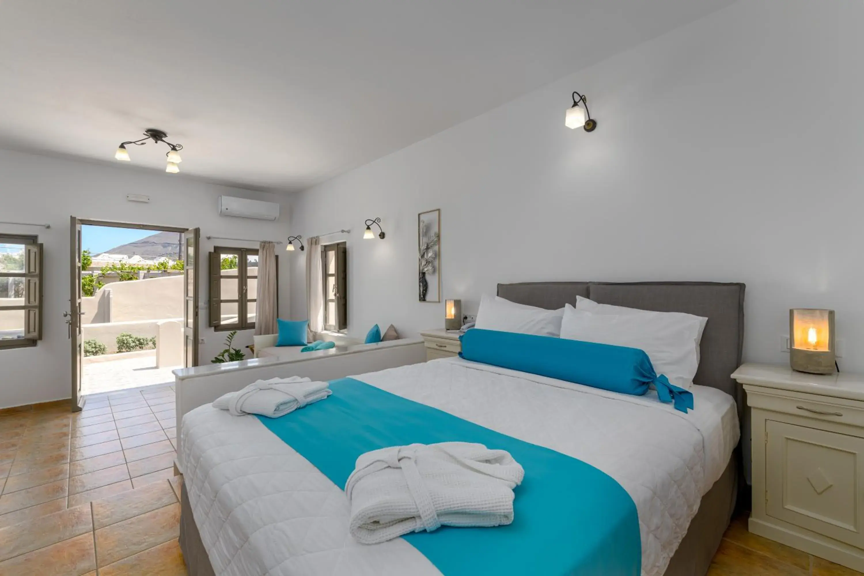 Bed in En Plo Boutique Suites Bed in En Plo Boutique Suites