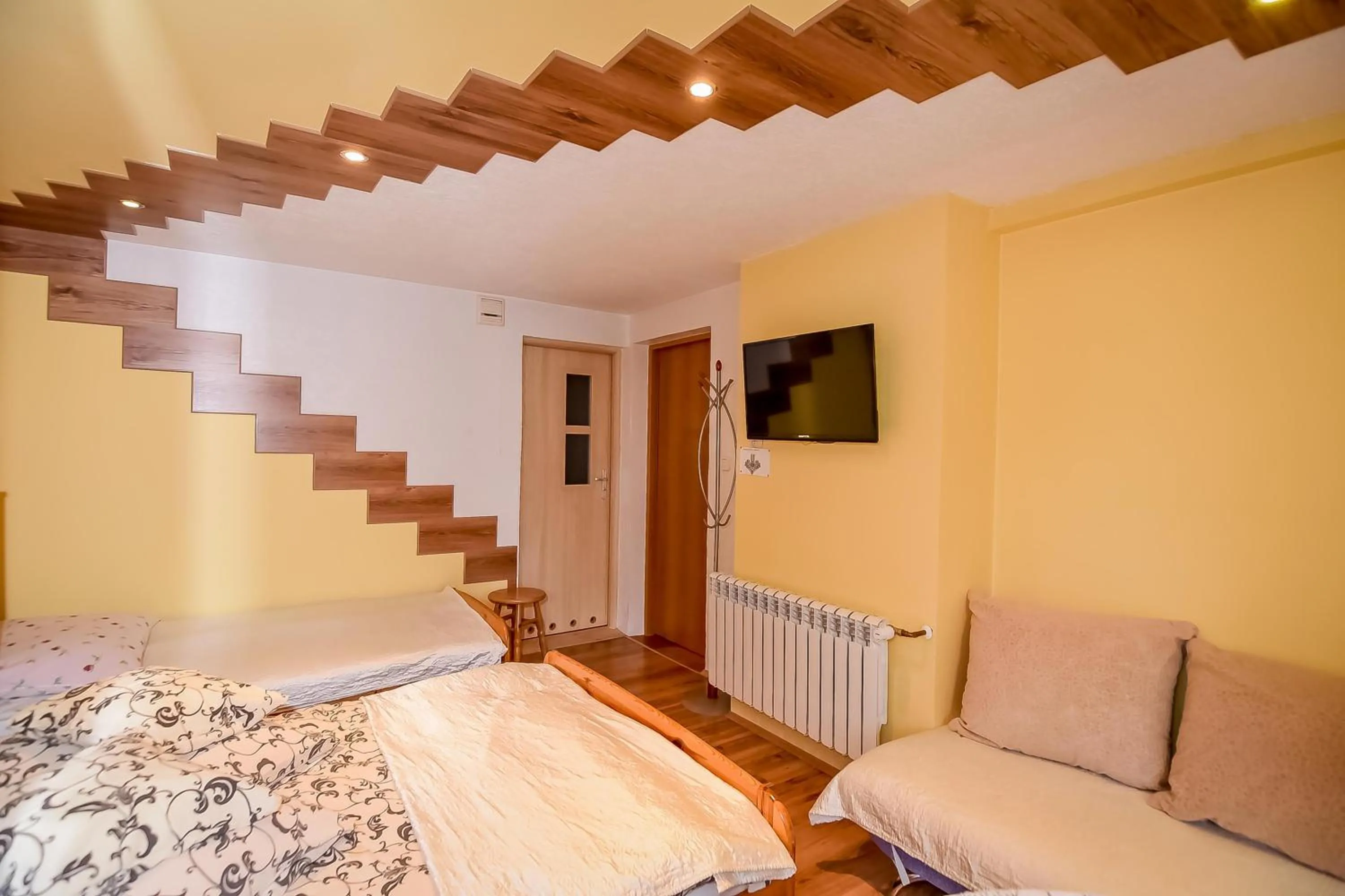 Bed in Ciukrowa Chatka Sauna & Jacuzzi