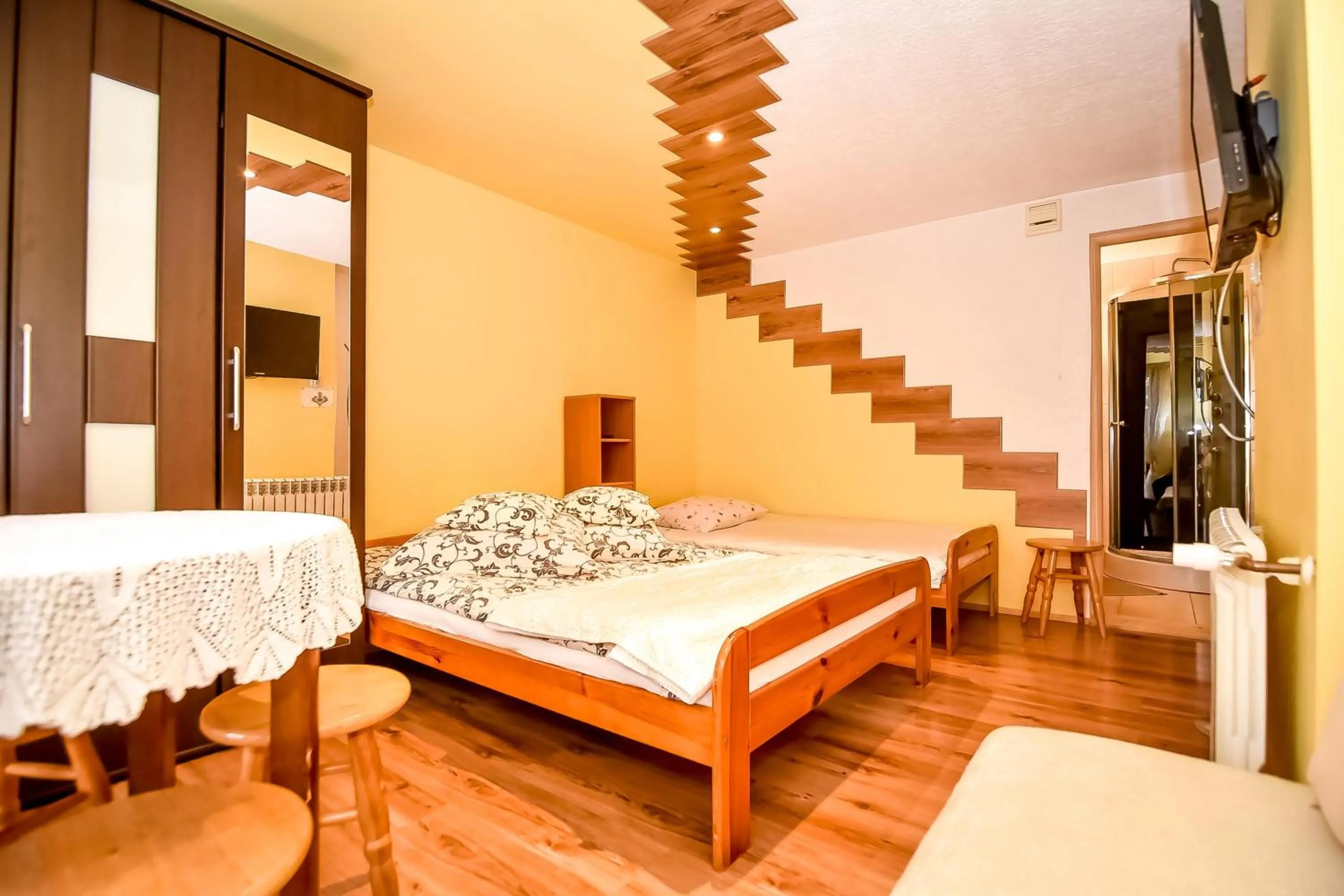 Bed in Ciukrowa Chatka Sauna & Jacuzzi