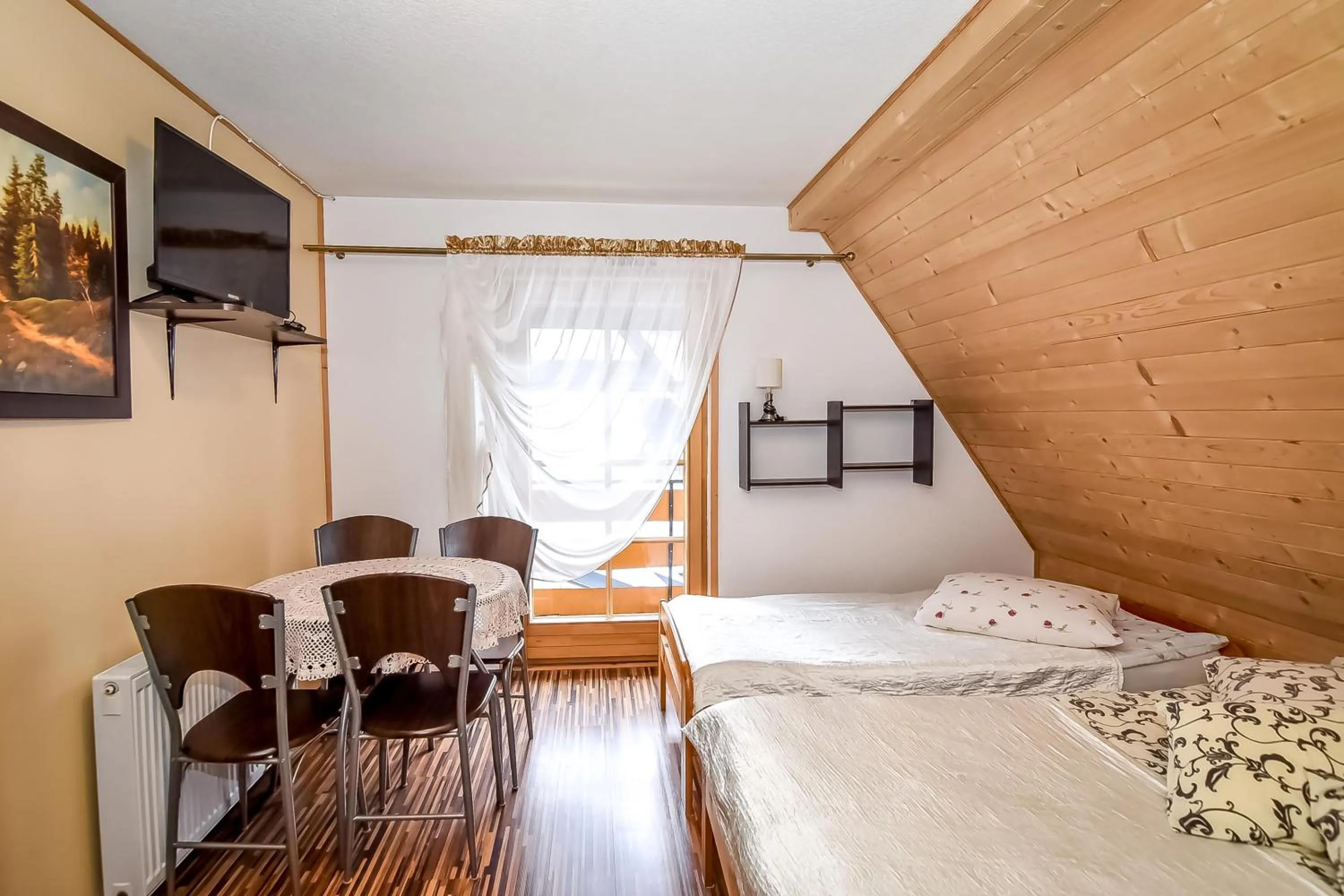 Bed in Ciukrowa Chatka Sauna & Jacuzzi