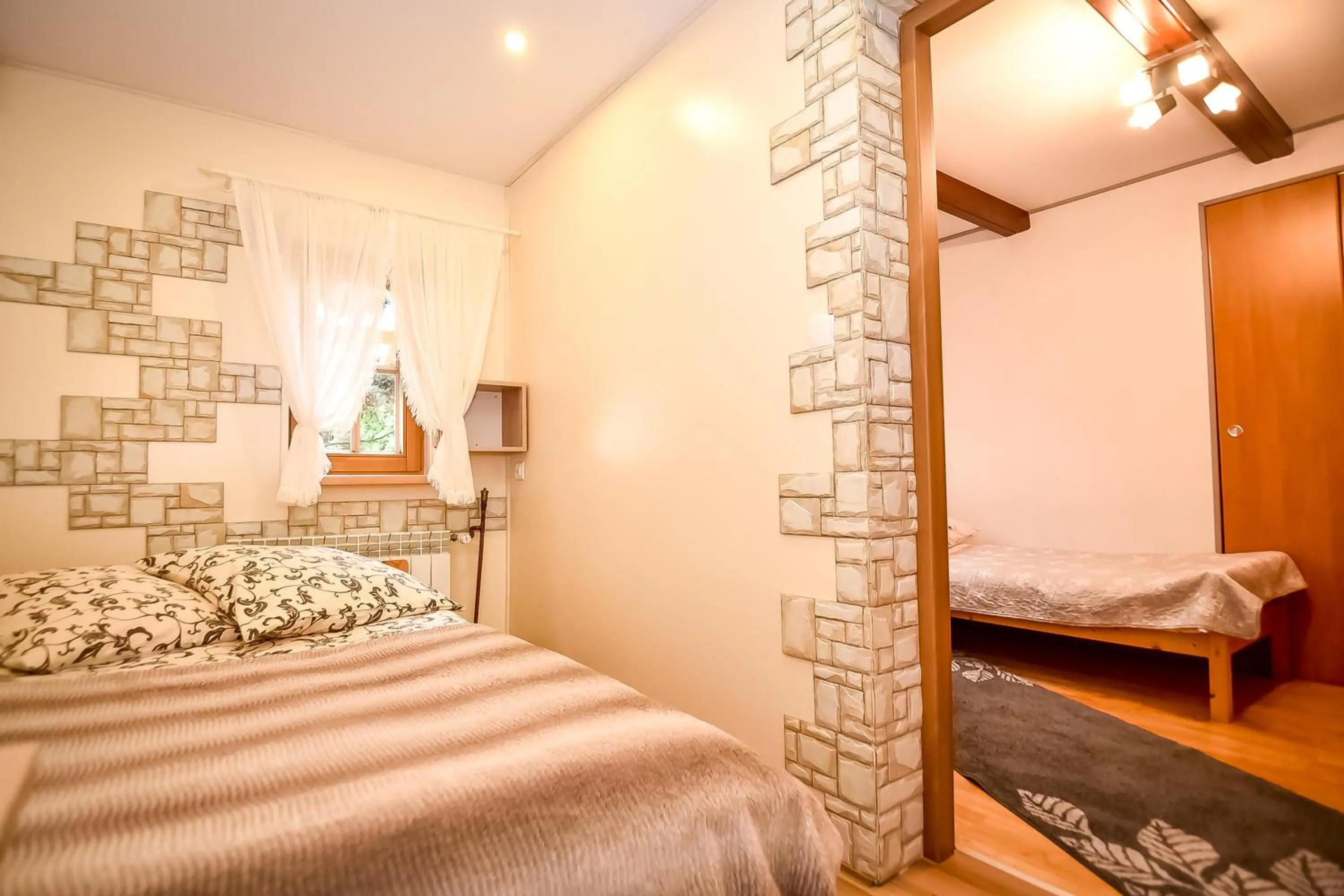 Bed in Ciukrowa Chatka Sauna & Jacuzzi