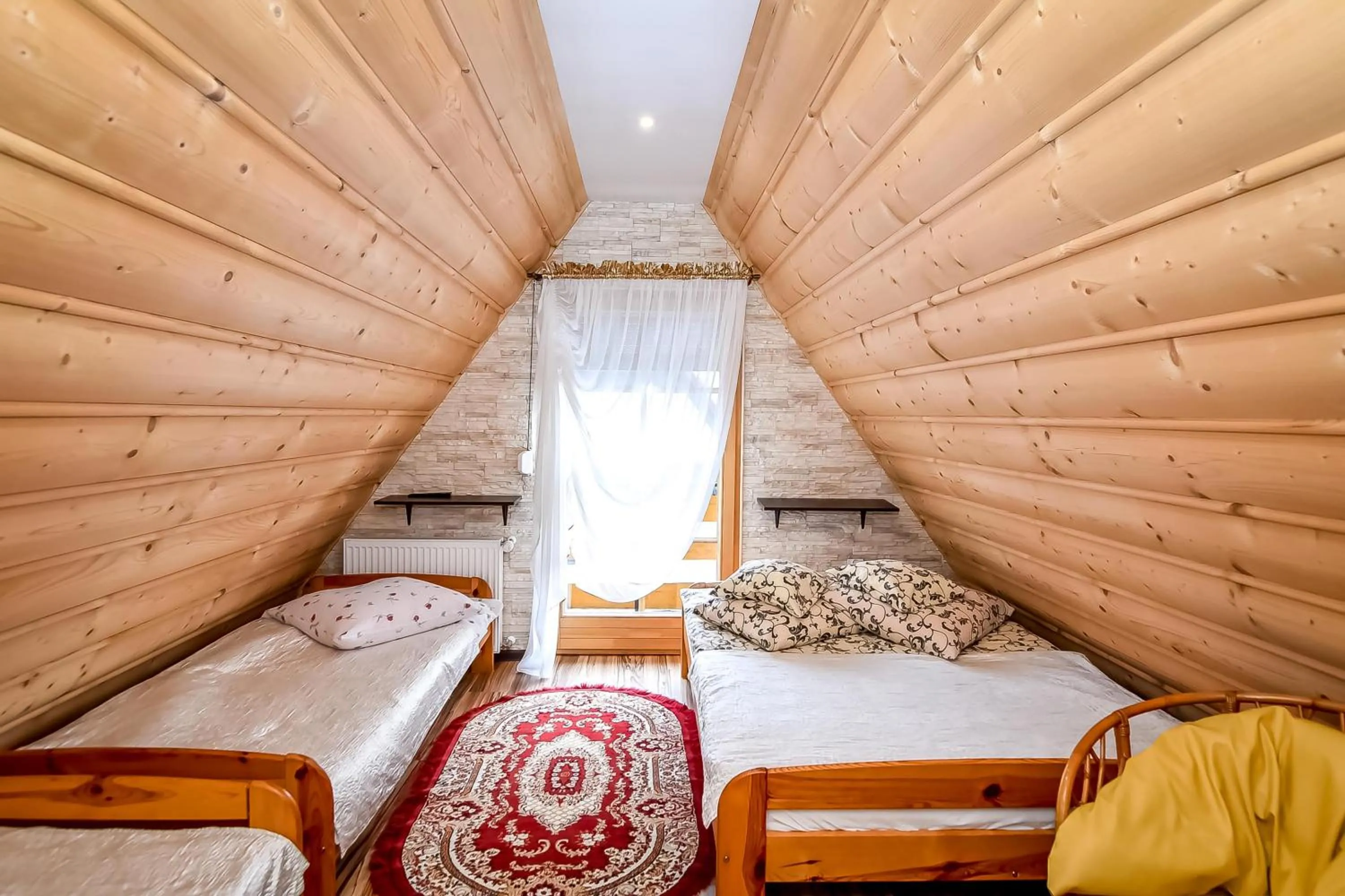 Bed in Ciukrowa Chatka Sauna & Jacuzzi