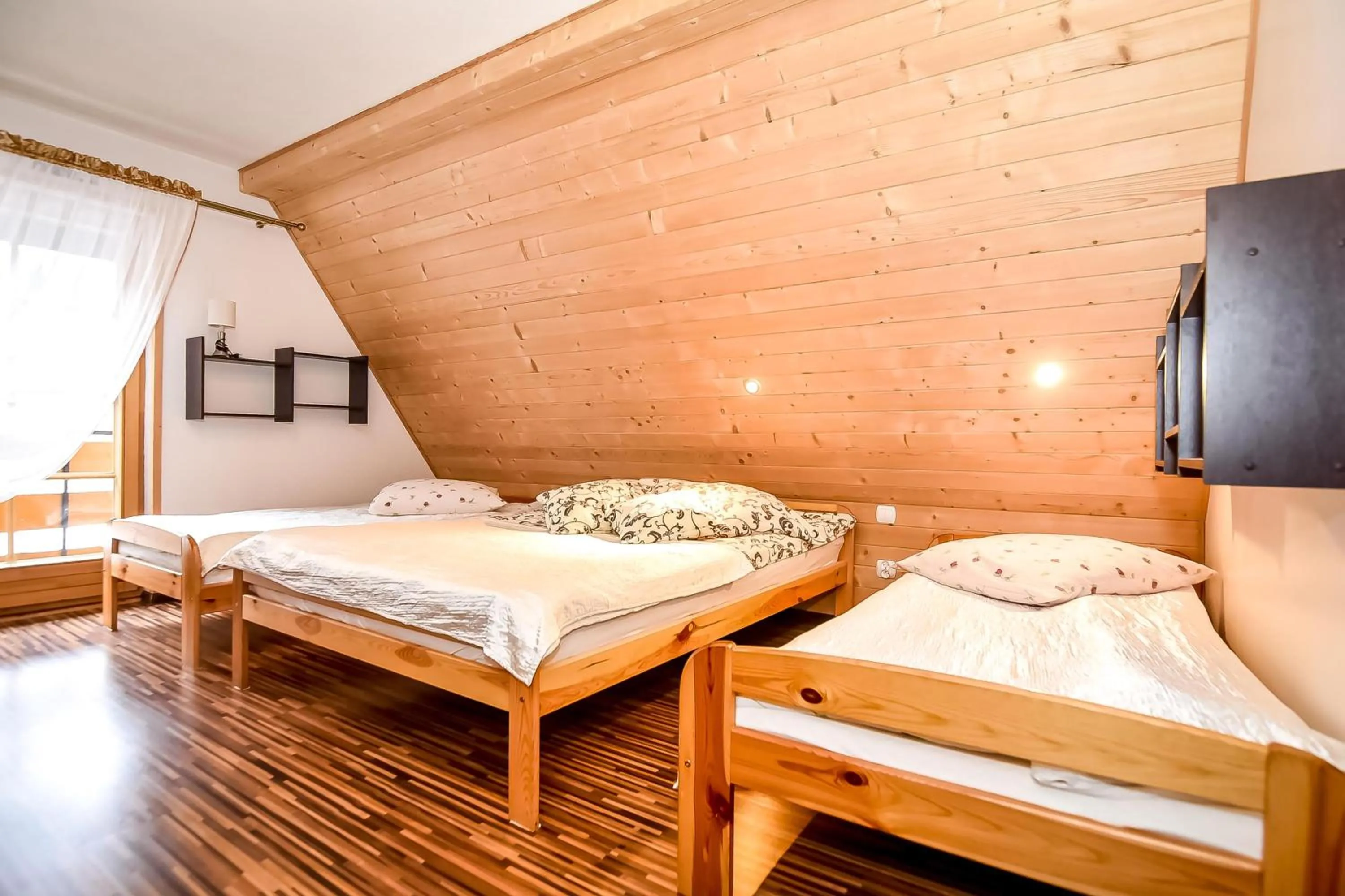 Bed in Ciukrowa Chatka Sauna & Jacuzzi