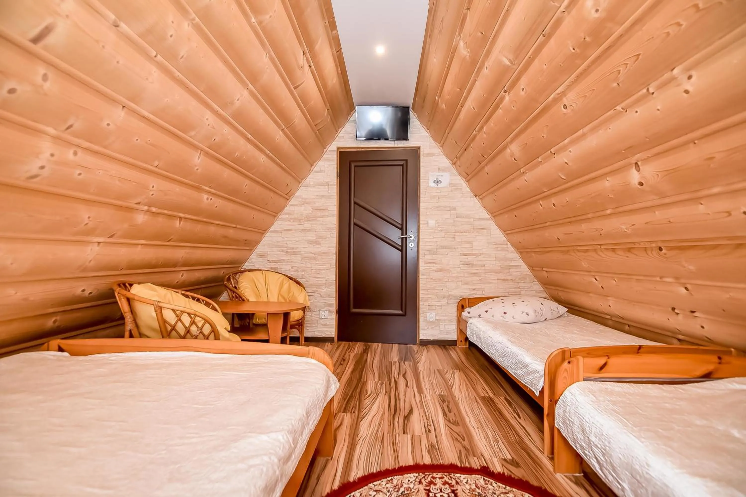 Bed in Ciukrowa Chatka Sauna & Jacuzzi