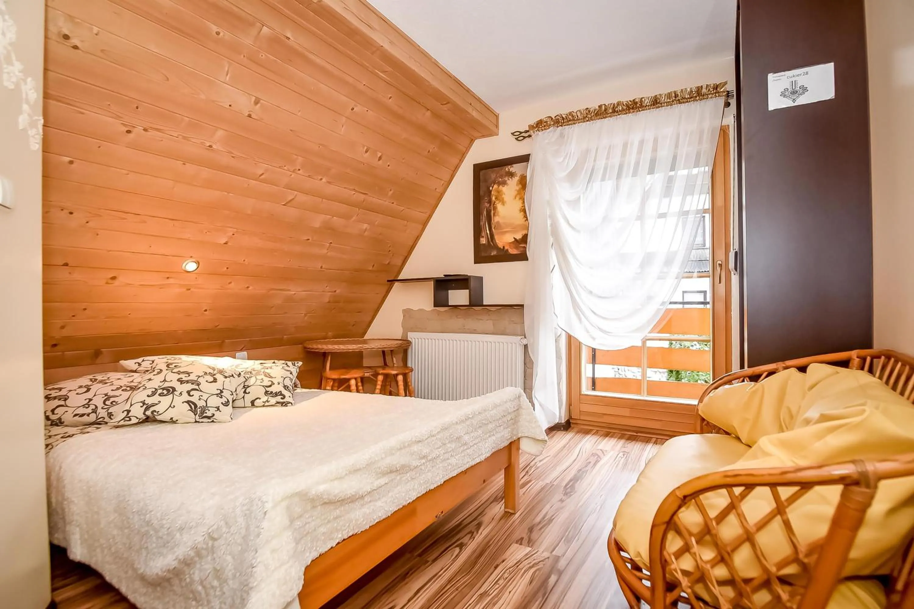 Bed in Ciukrowa Chatka Sauna & Jacuzzi