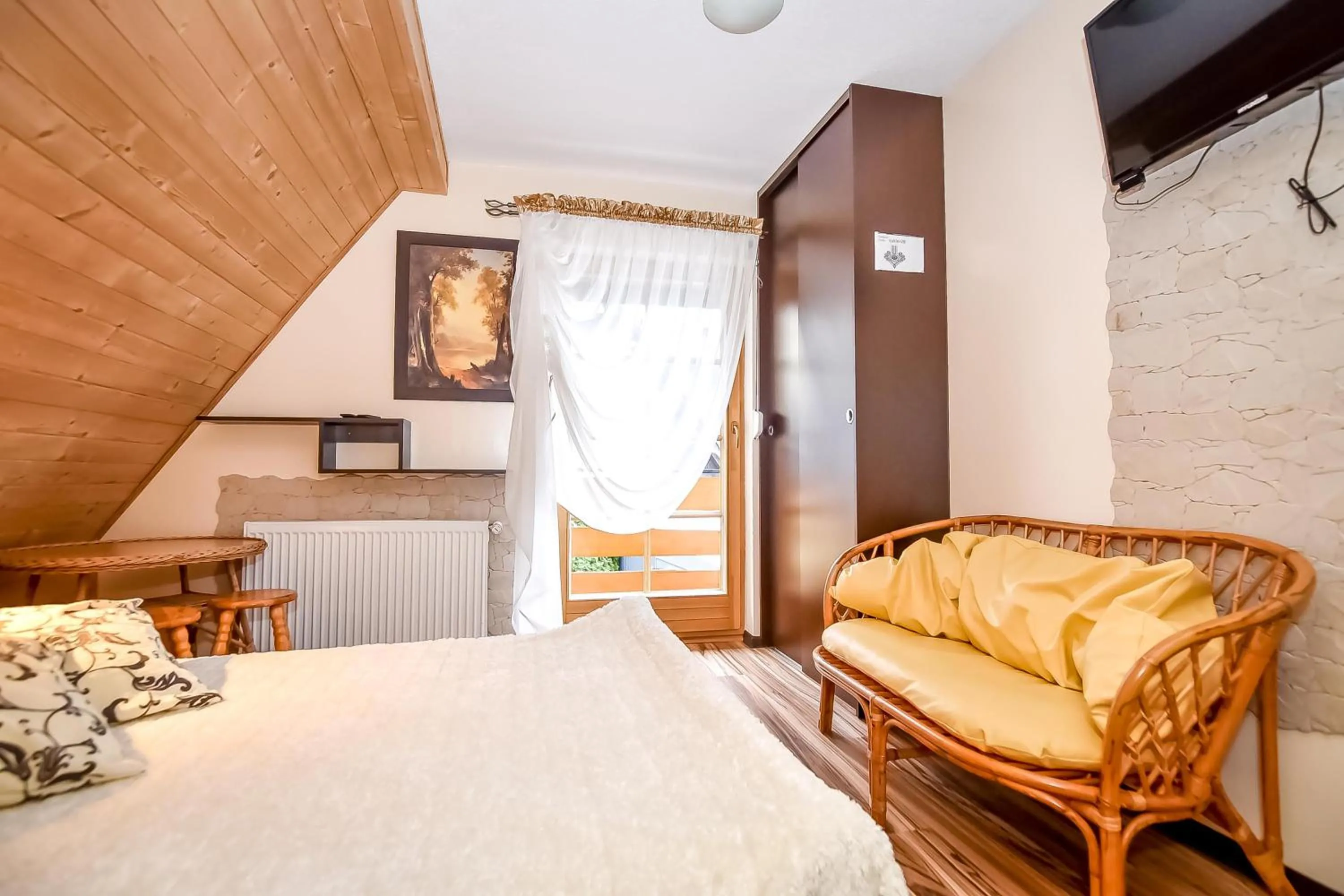 Bed in Ciukrowa Chatka Sauna & Jacuzzi