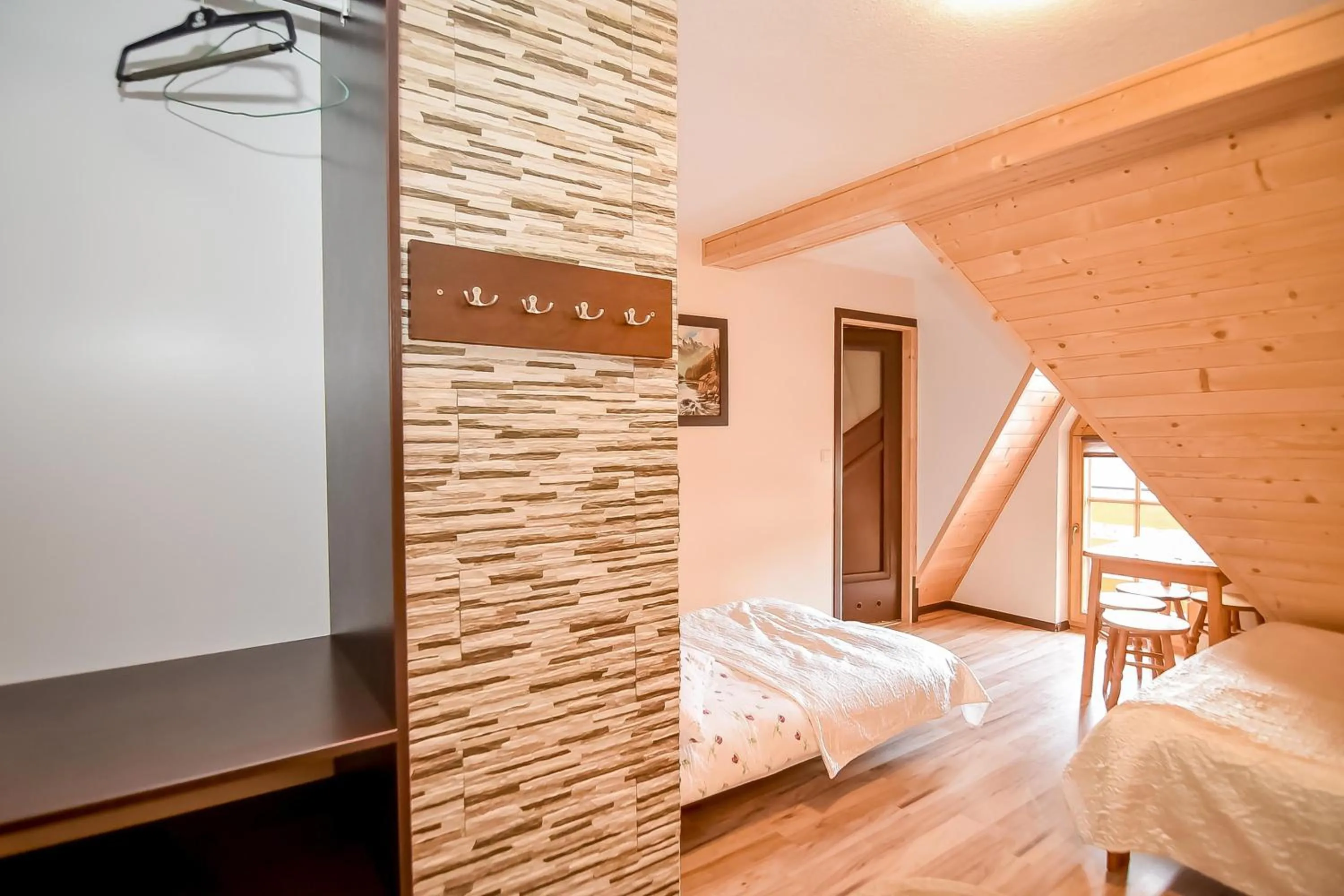 Bed in Ciukrowa Chatka Sauna & Jacuzzi
