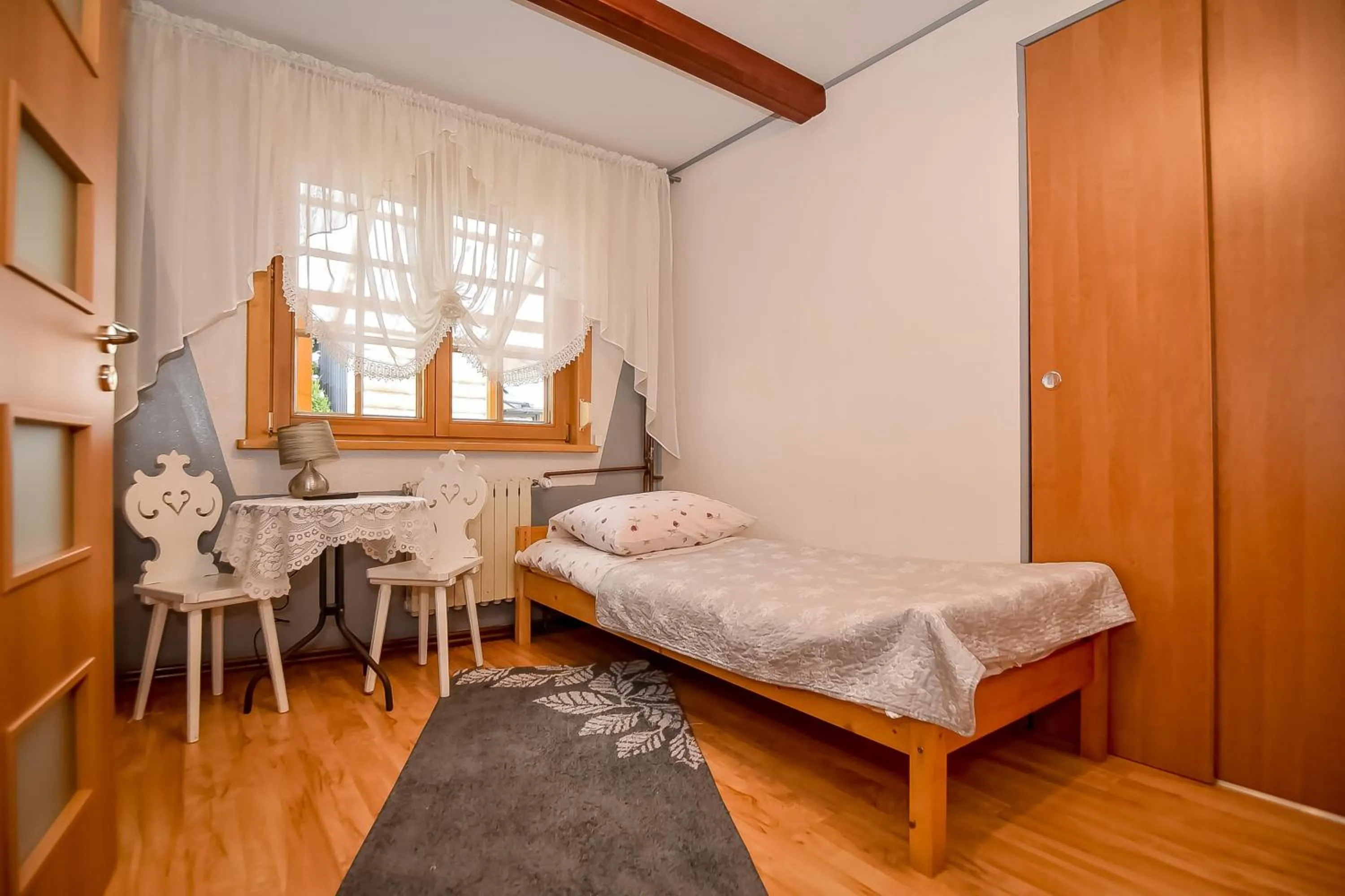 Bed in Ciukrowa Chatka Sauna & Jacuzzi