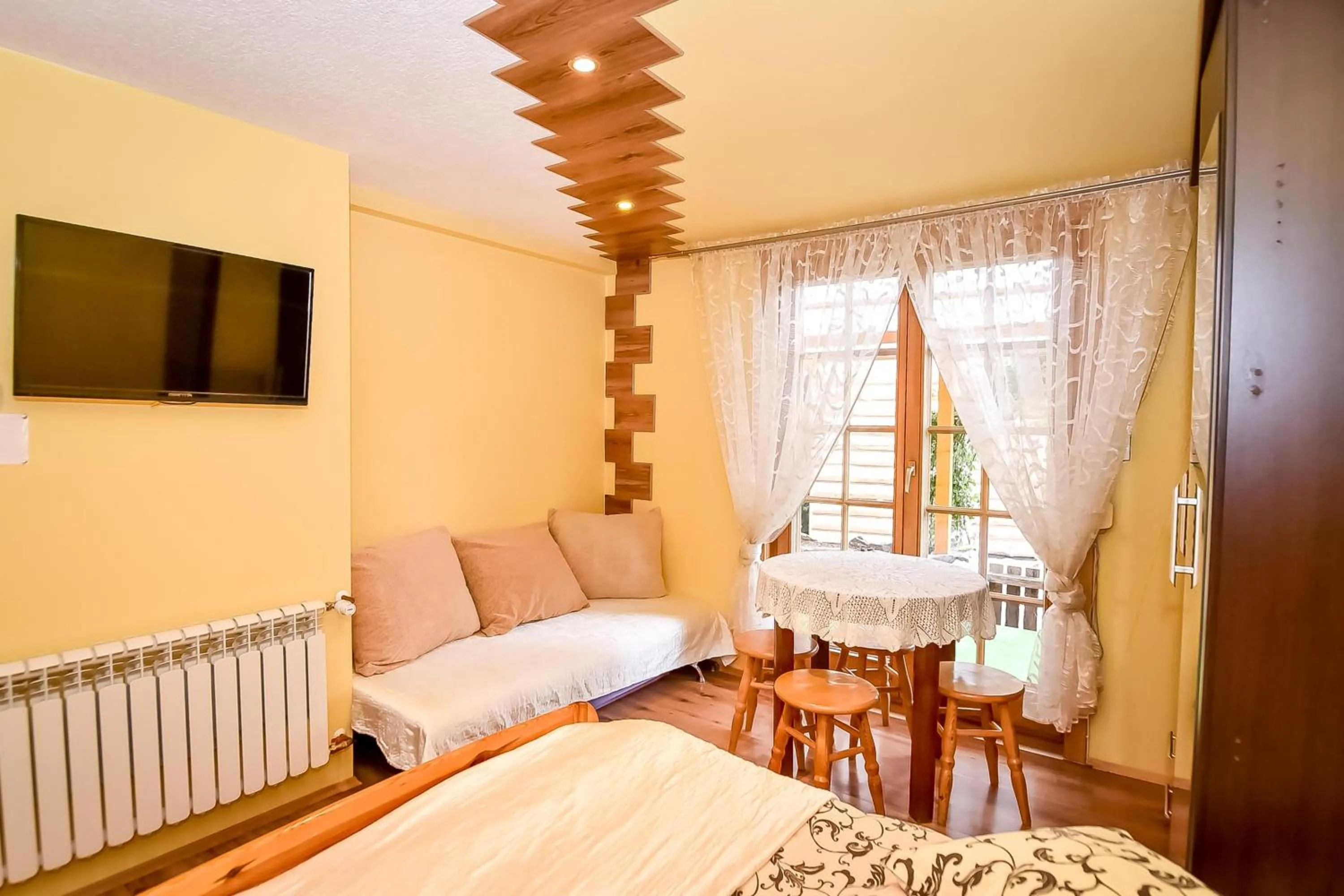 Bed in Ciukrowa Chatka Sauna & Jacuzzi
