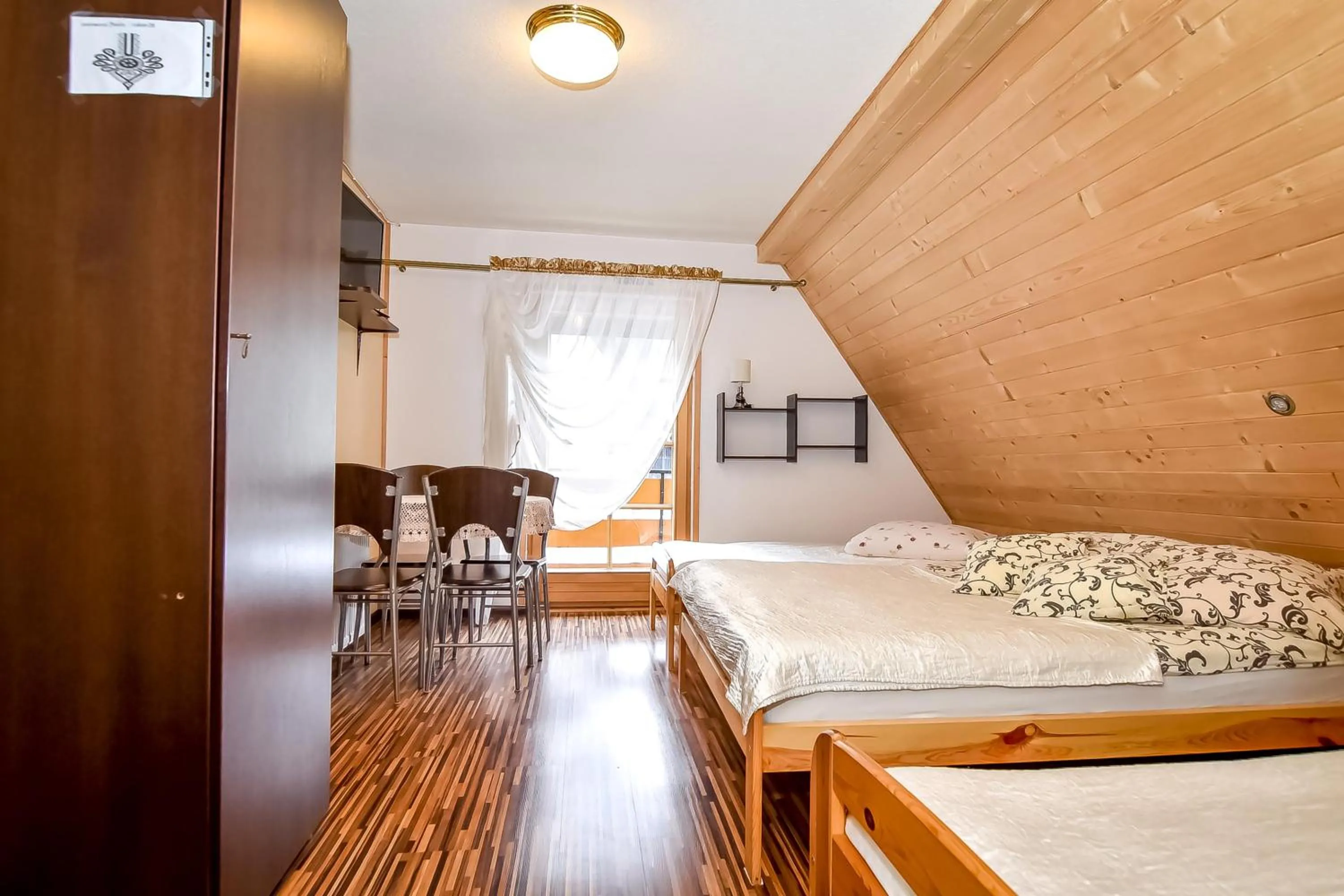 Bed in Ciukrowa Chatka Sauna & Jacuzzi