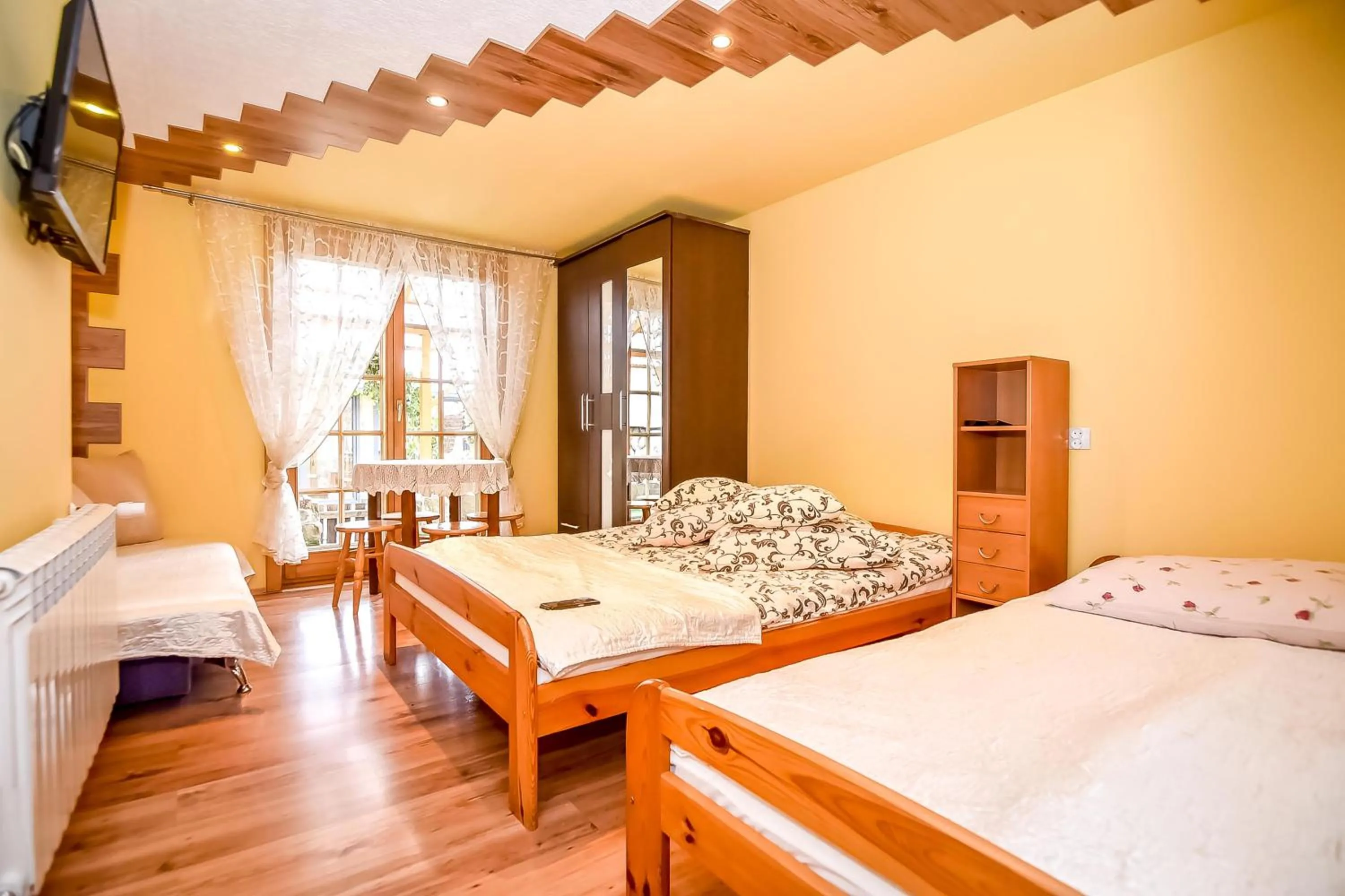 Bed in Ciukrowa Chatka Sauna & Jacuzzi