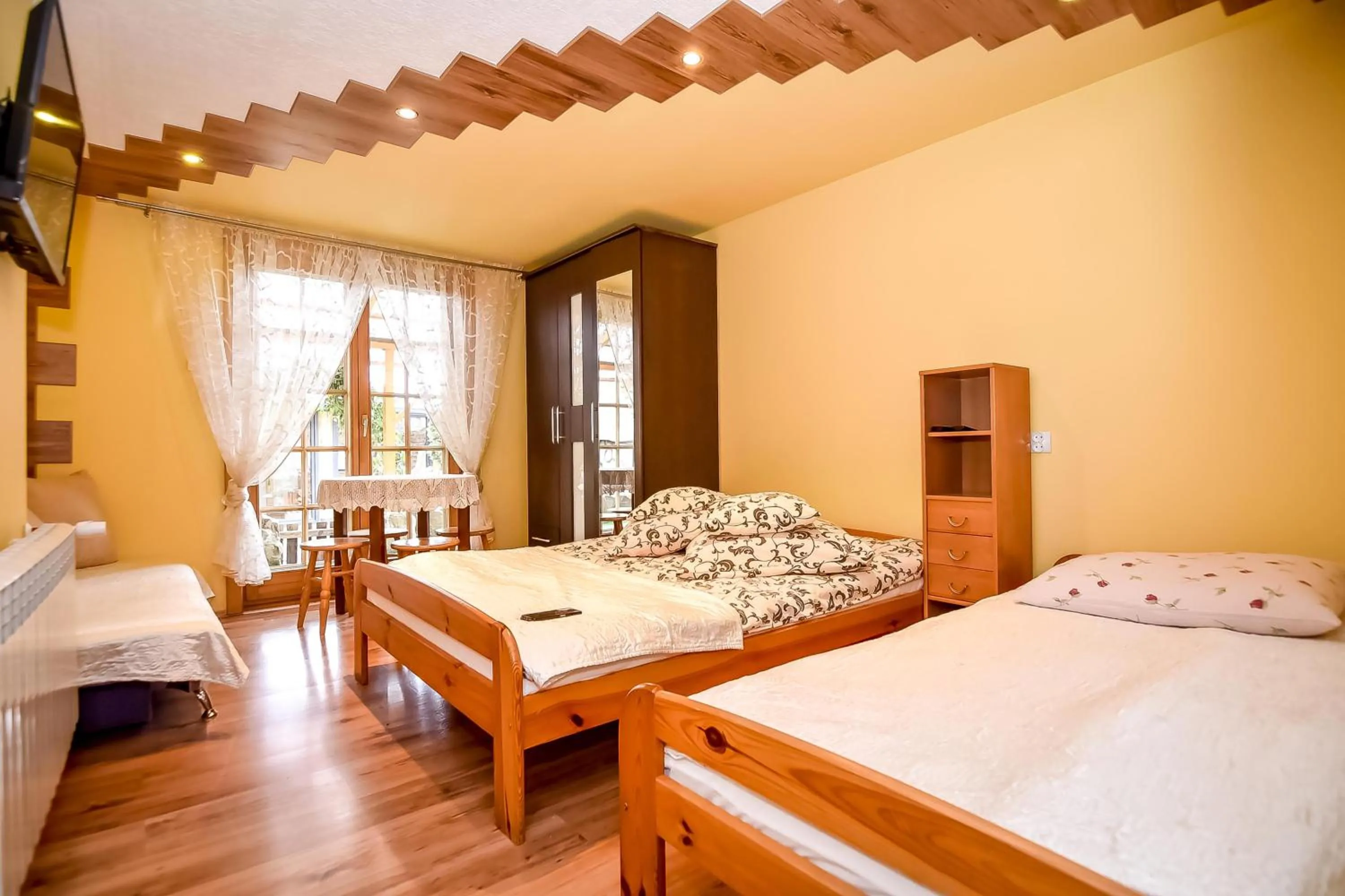 Bed in Ciukrowa Chatka Sauna & Jacuzzi