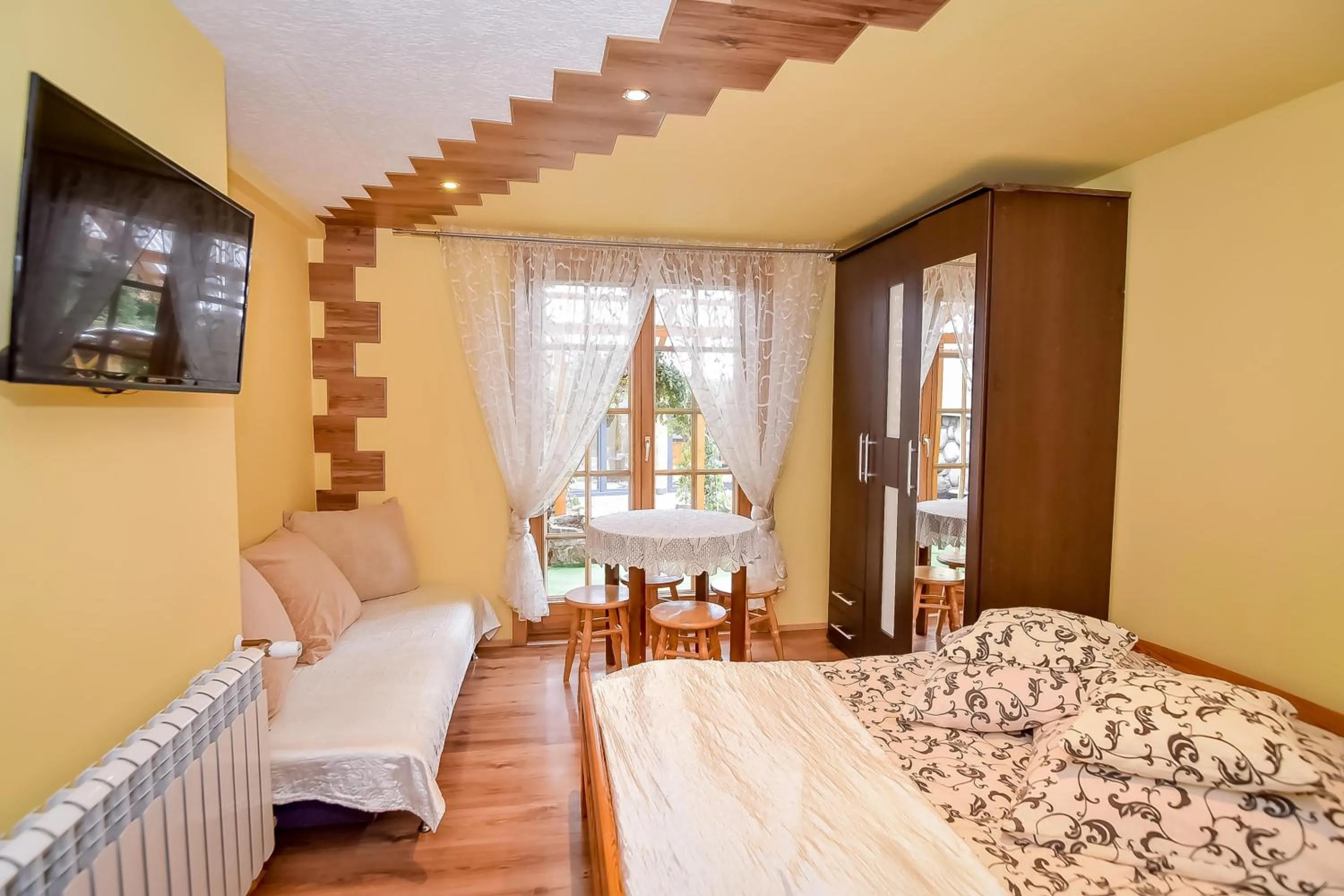 Bed in Ciukrowa Chatka Sauna & Jacuzzi