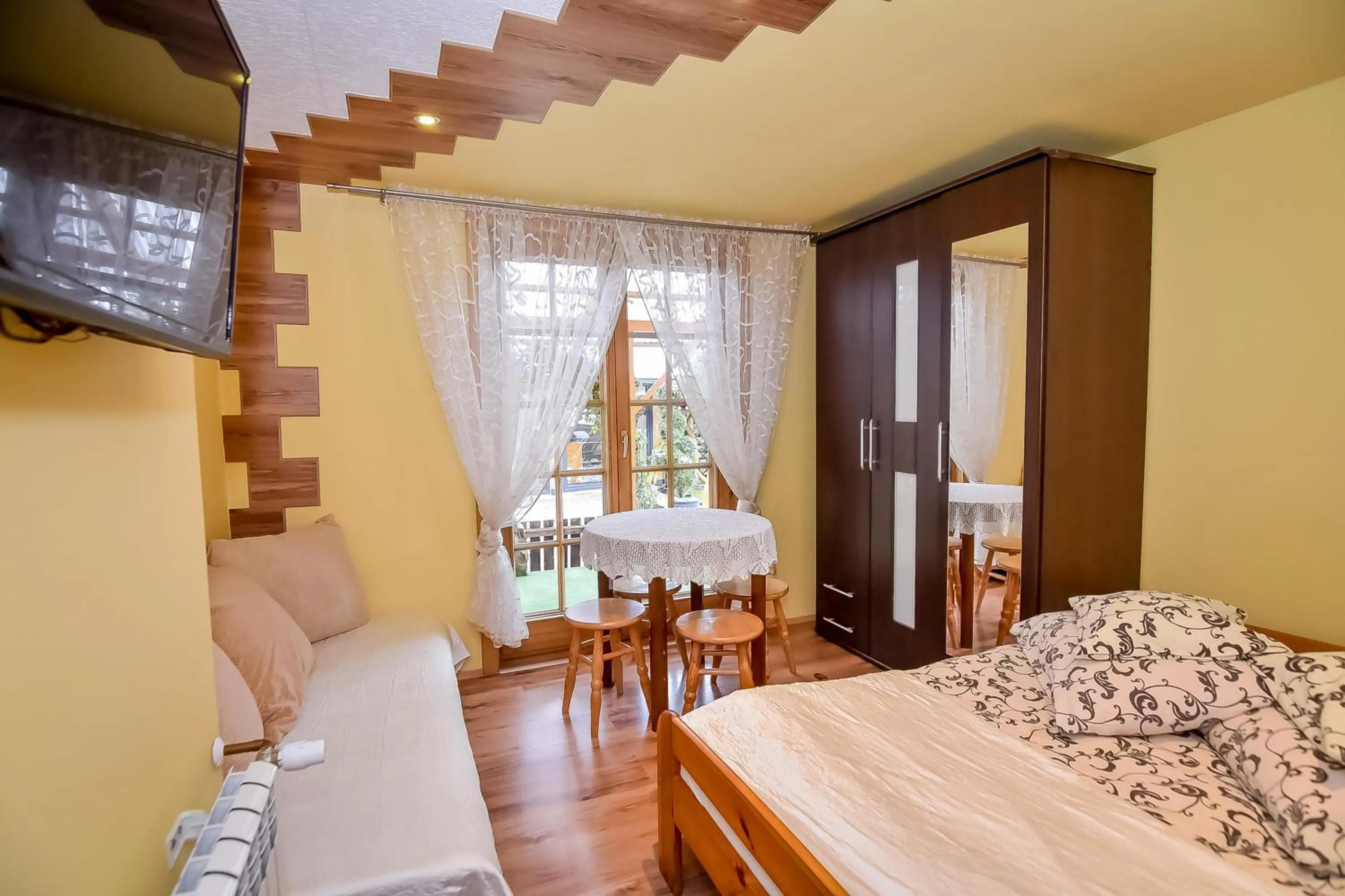 Bed in Ciukrowa Chatka Sauna & Jacuzzi
