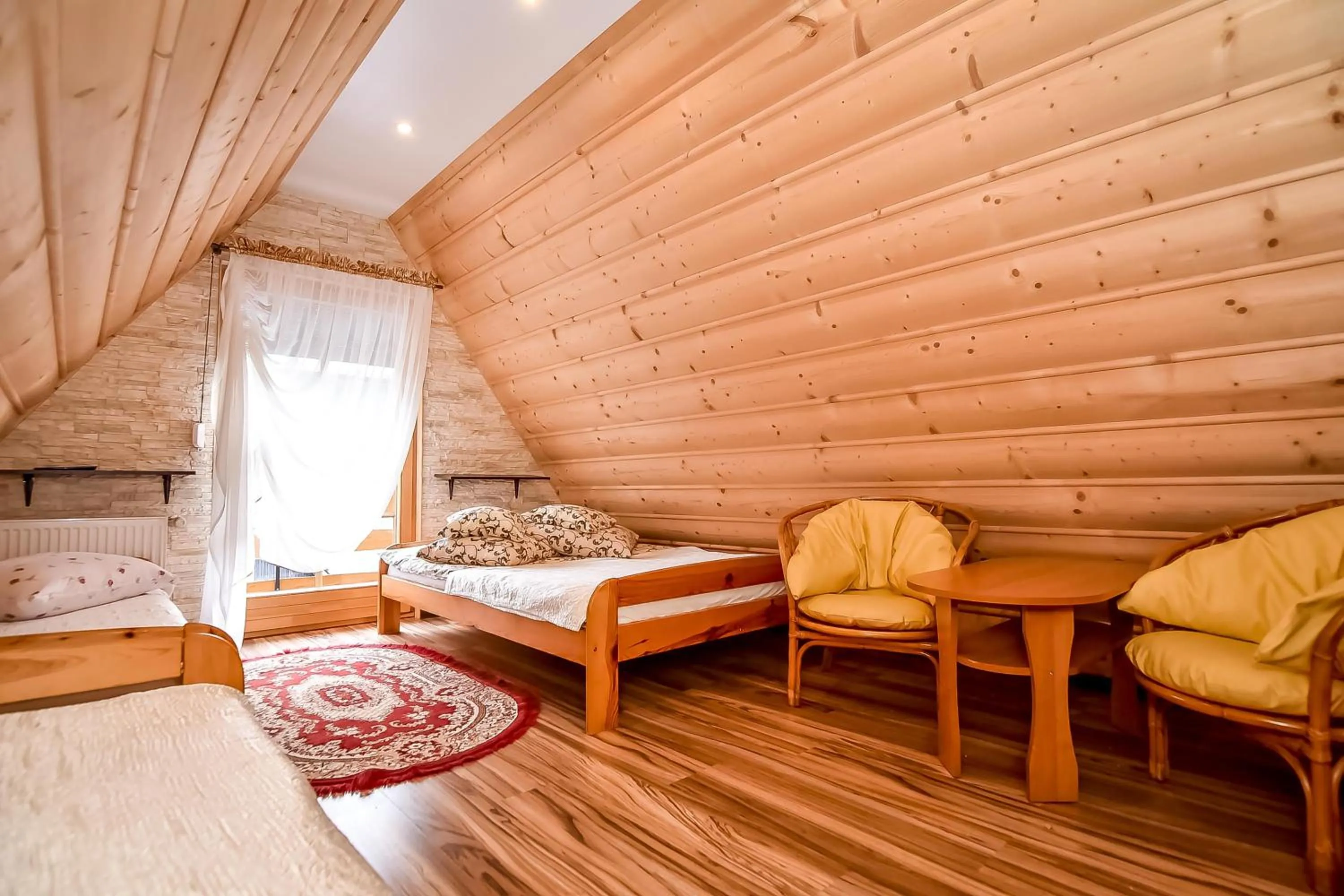 Bed in Ciukrowa Chatka Sauna & Jacuzzi
