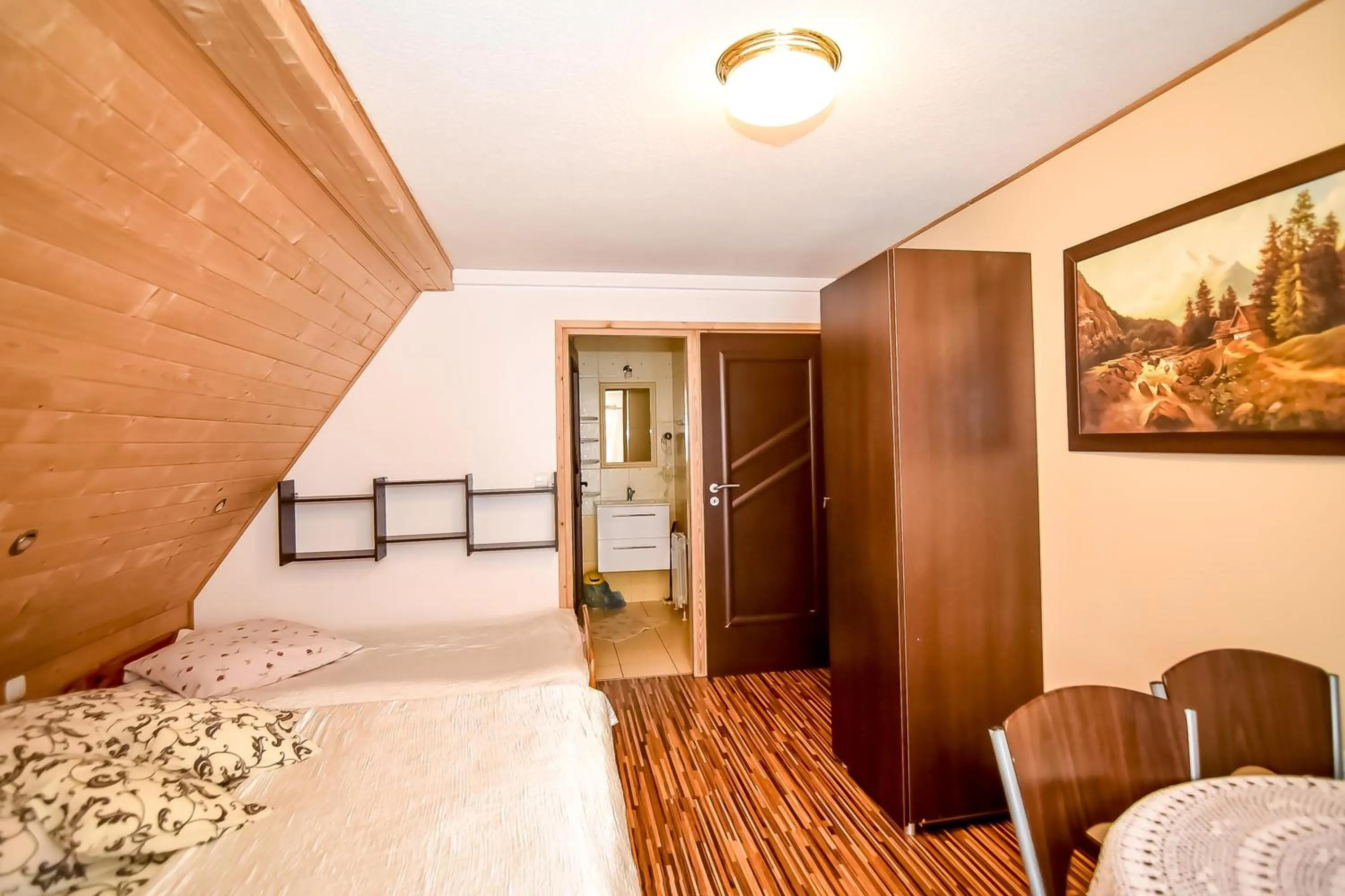 Bed in Ciukrowa Chatka Sauna & Jacuzzi