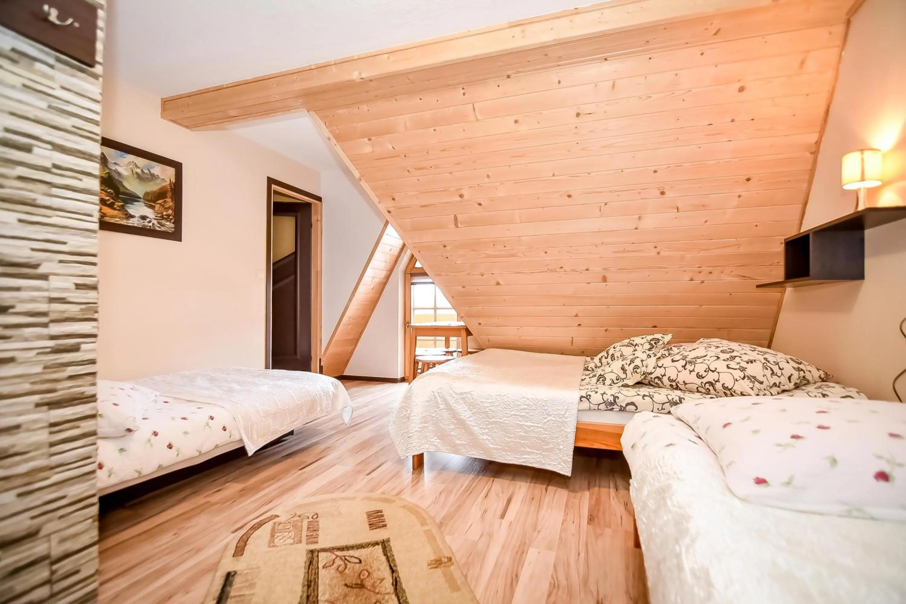 Bed in Ciukrowa Chatka Sauna & Jacuzzi