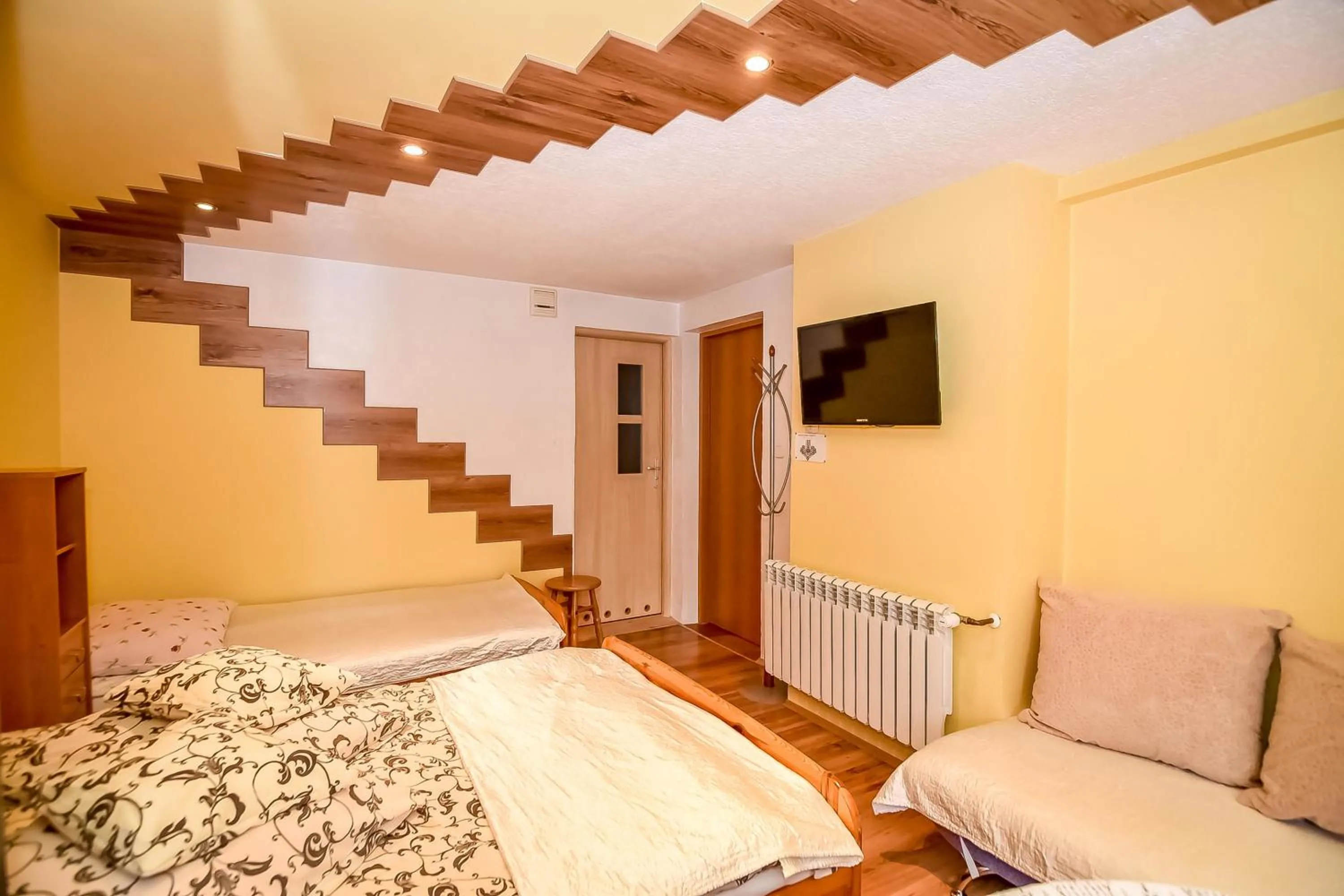 Bed in Ciukrowa Chatka Sauna & Jacuzzi
