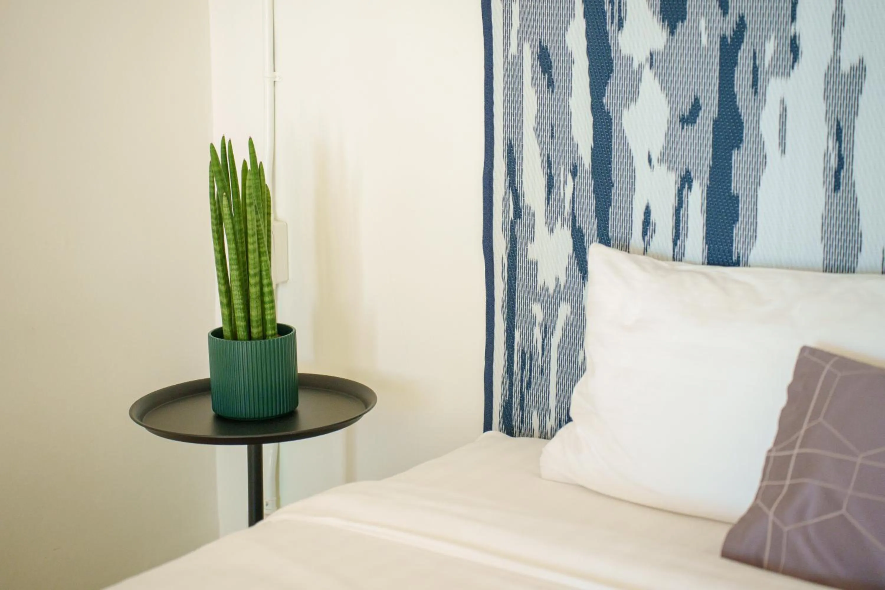 Bed in Gecko EYE Hotel