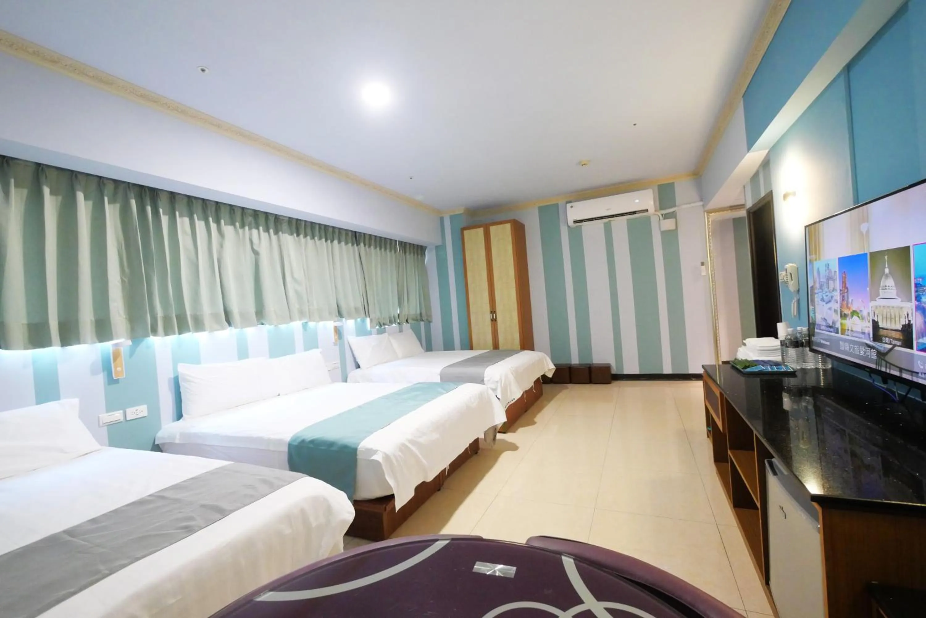 Bed in I Hi Loveriver Hotel