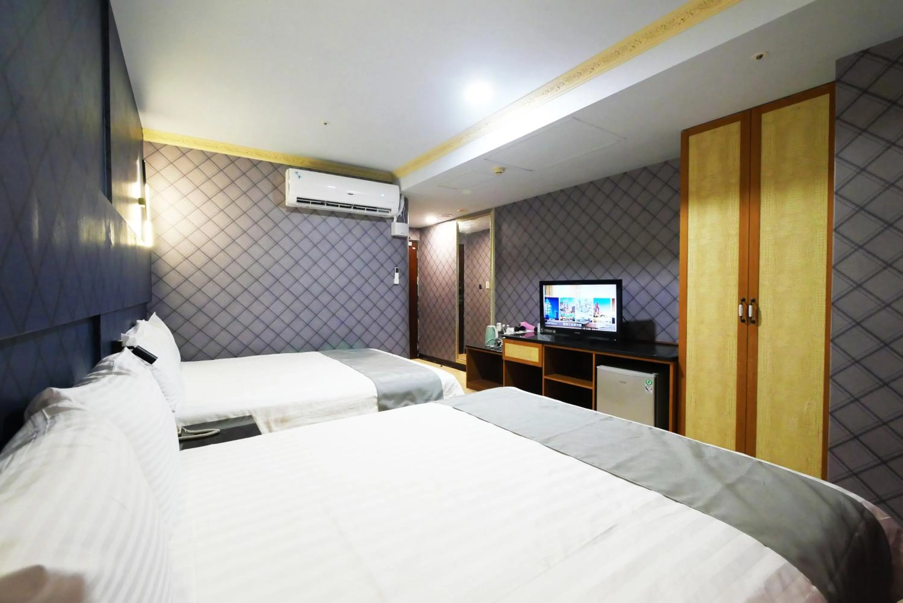 Bed in I Hi Loveriver Hotel