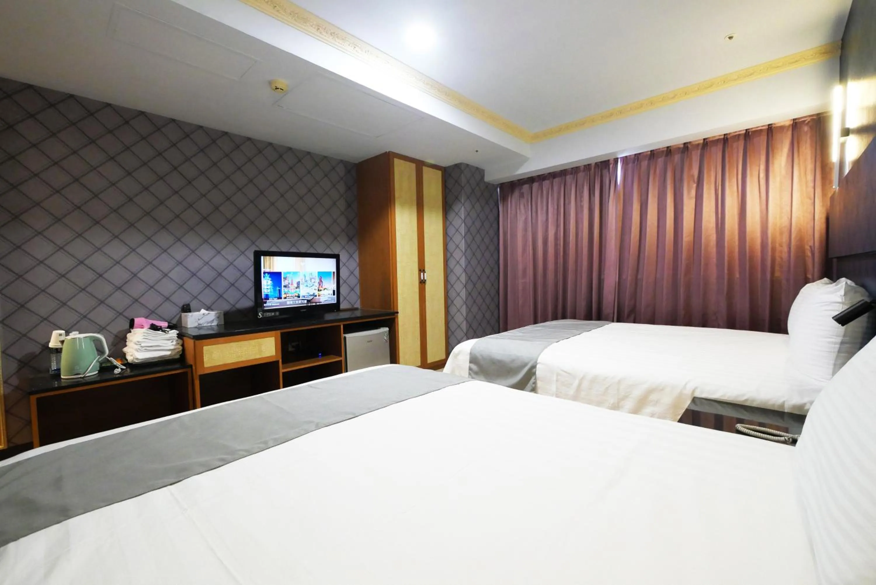 Bed in I Hi Loveriver Hotel