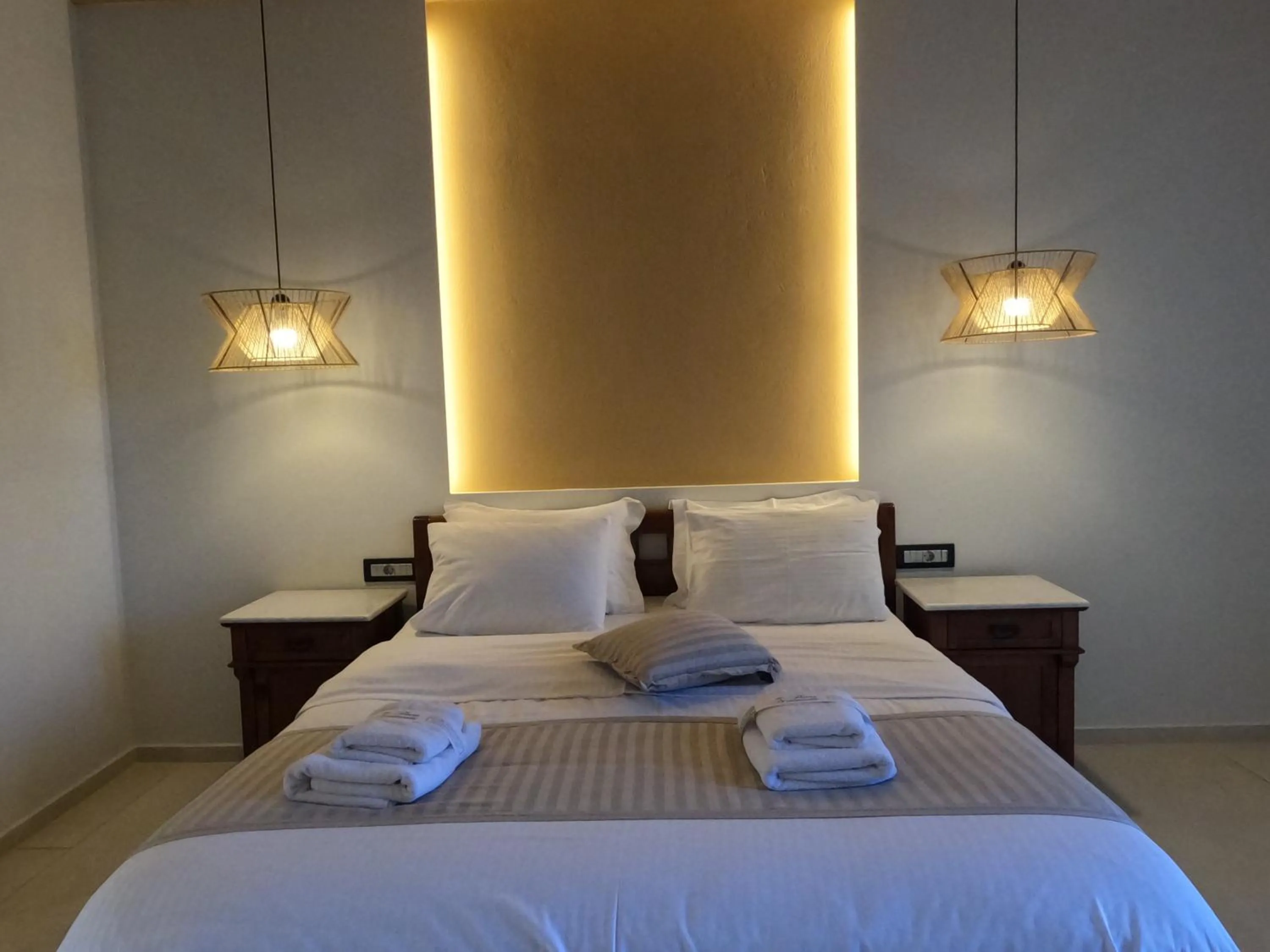 Bed in The Flower Of Monemvasia Hotel