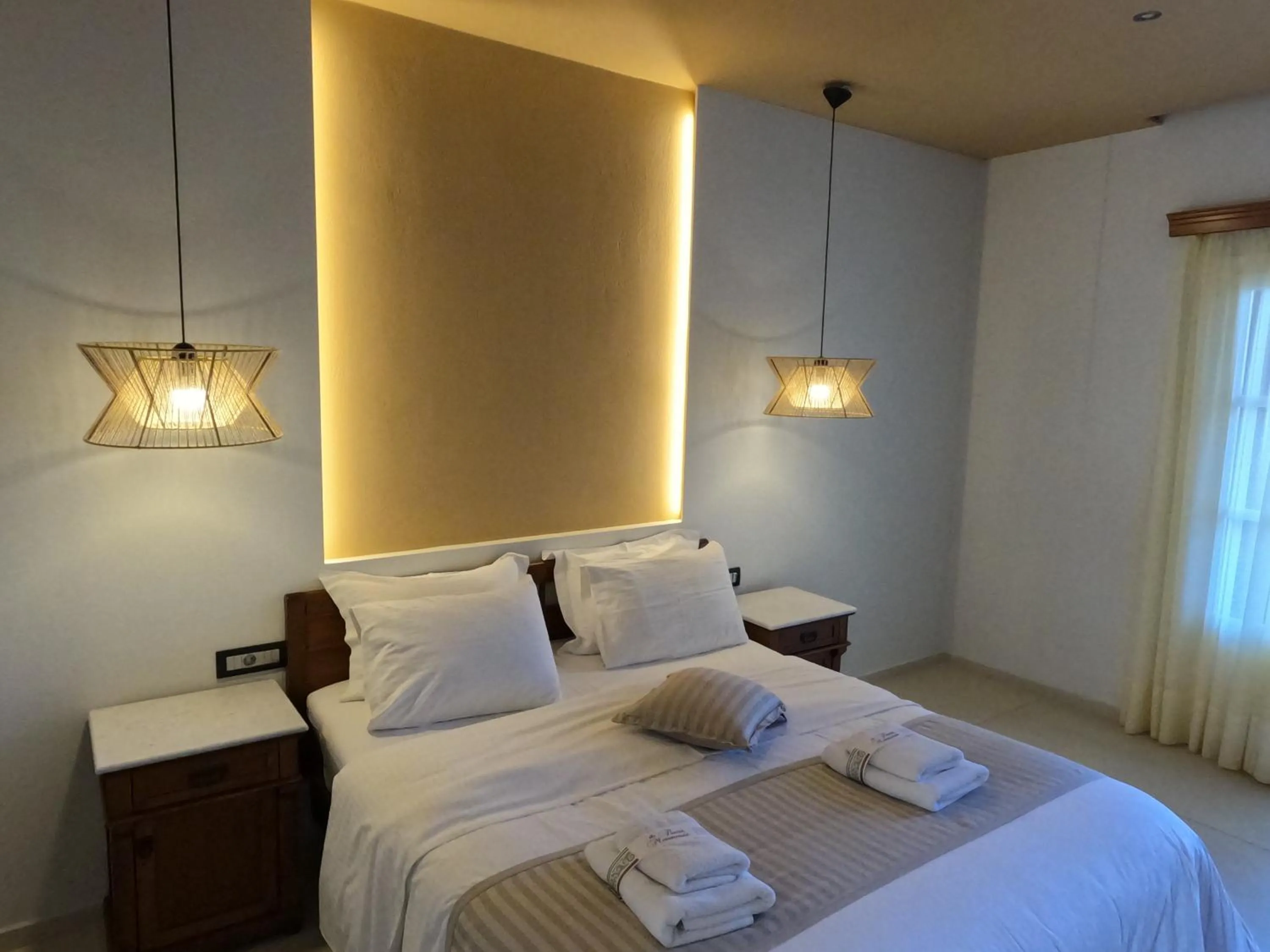 Bed in The Flower Of Monemvasia Hotel