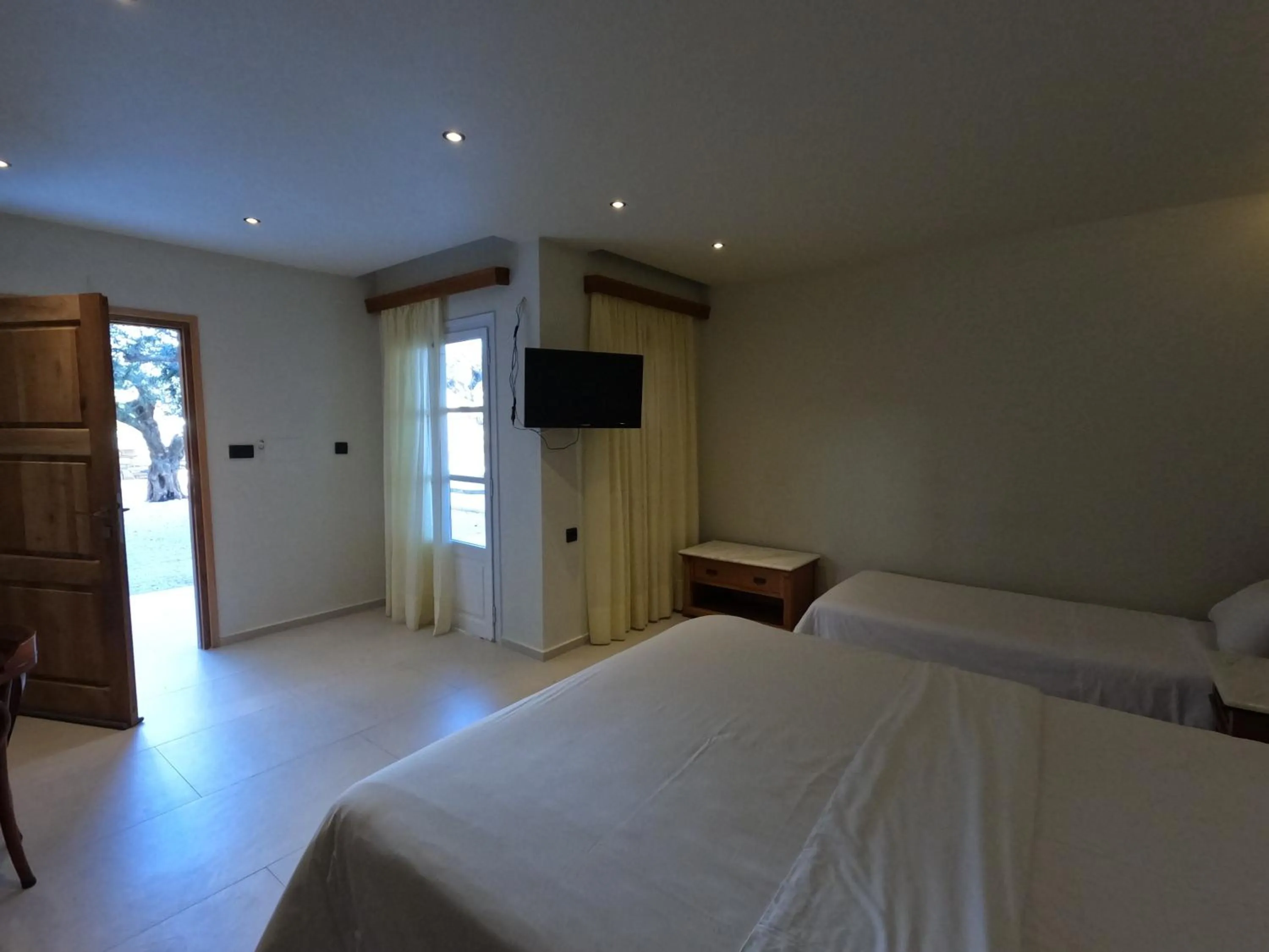 Bed in The Flower Of Monemvasia Hotel