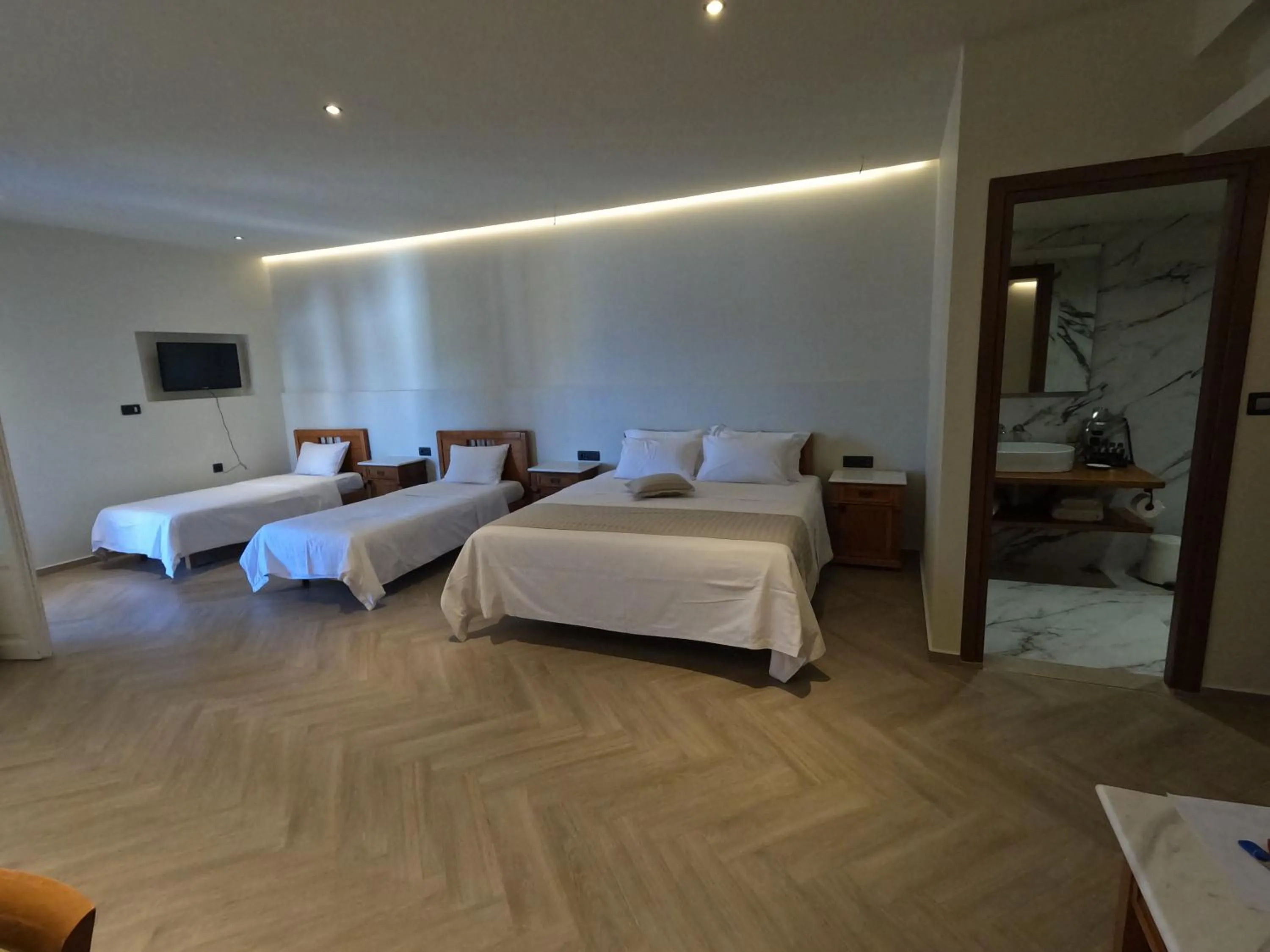 Bed in The Flower Of Monemvasia Hotel