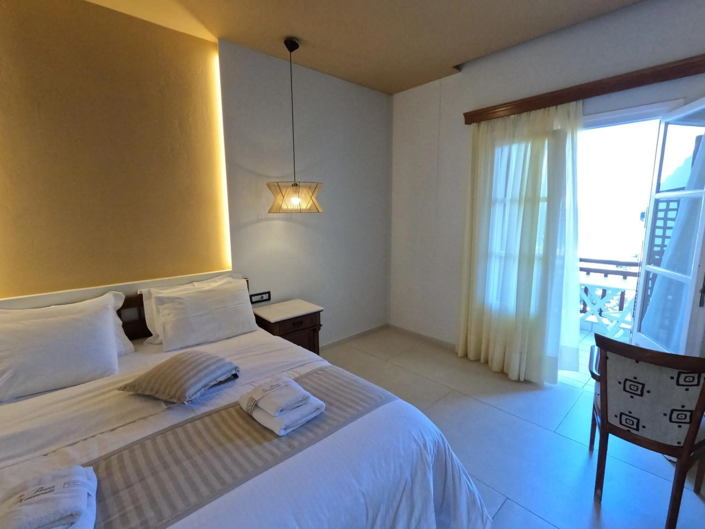 Bed in The Flower Of Monemvasia Hotel