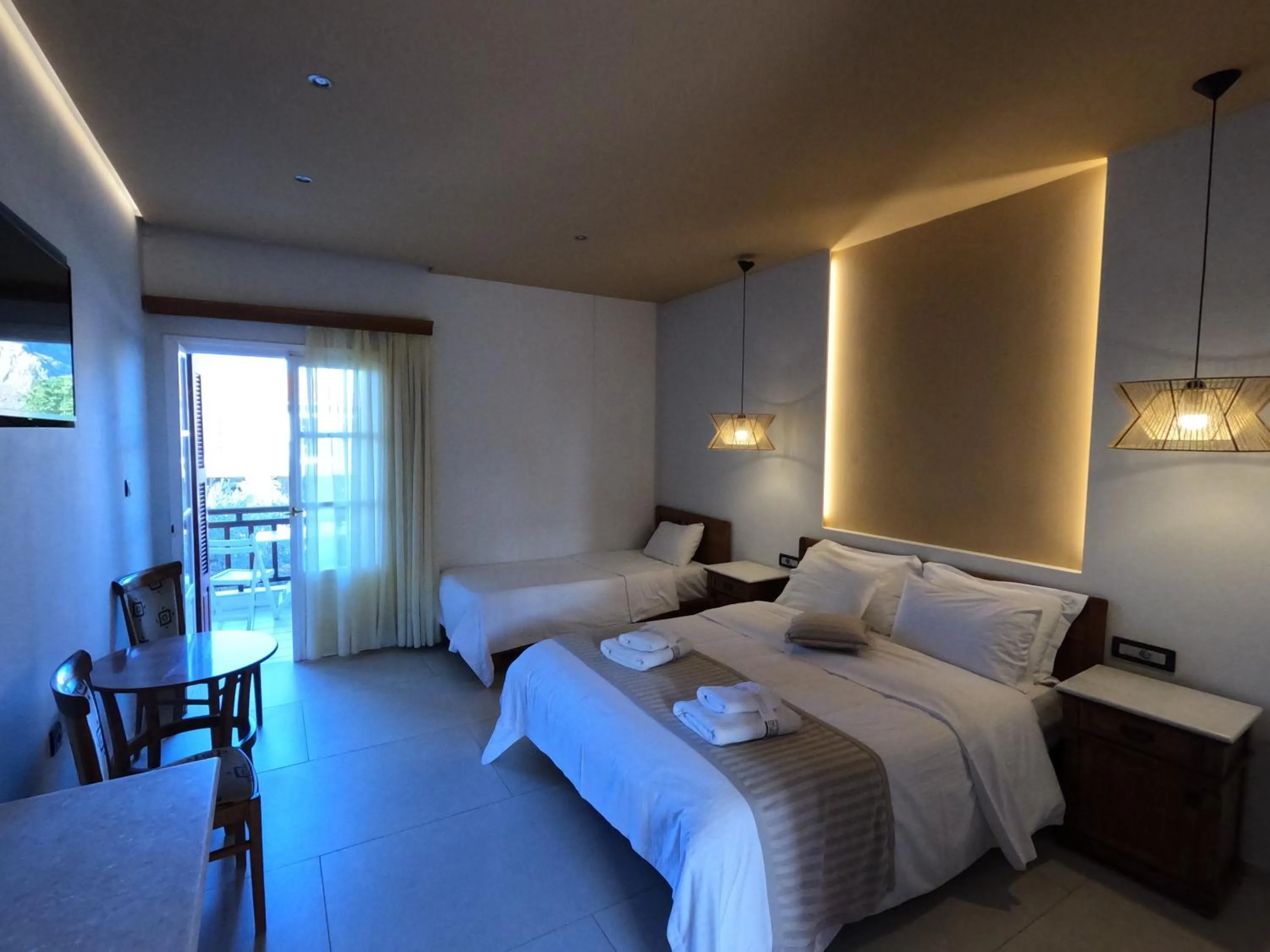 Bed in The Flower Of Monemvasia Hotel