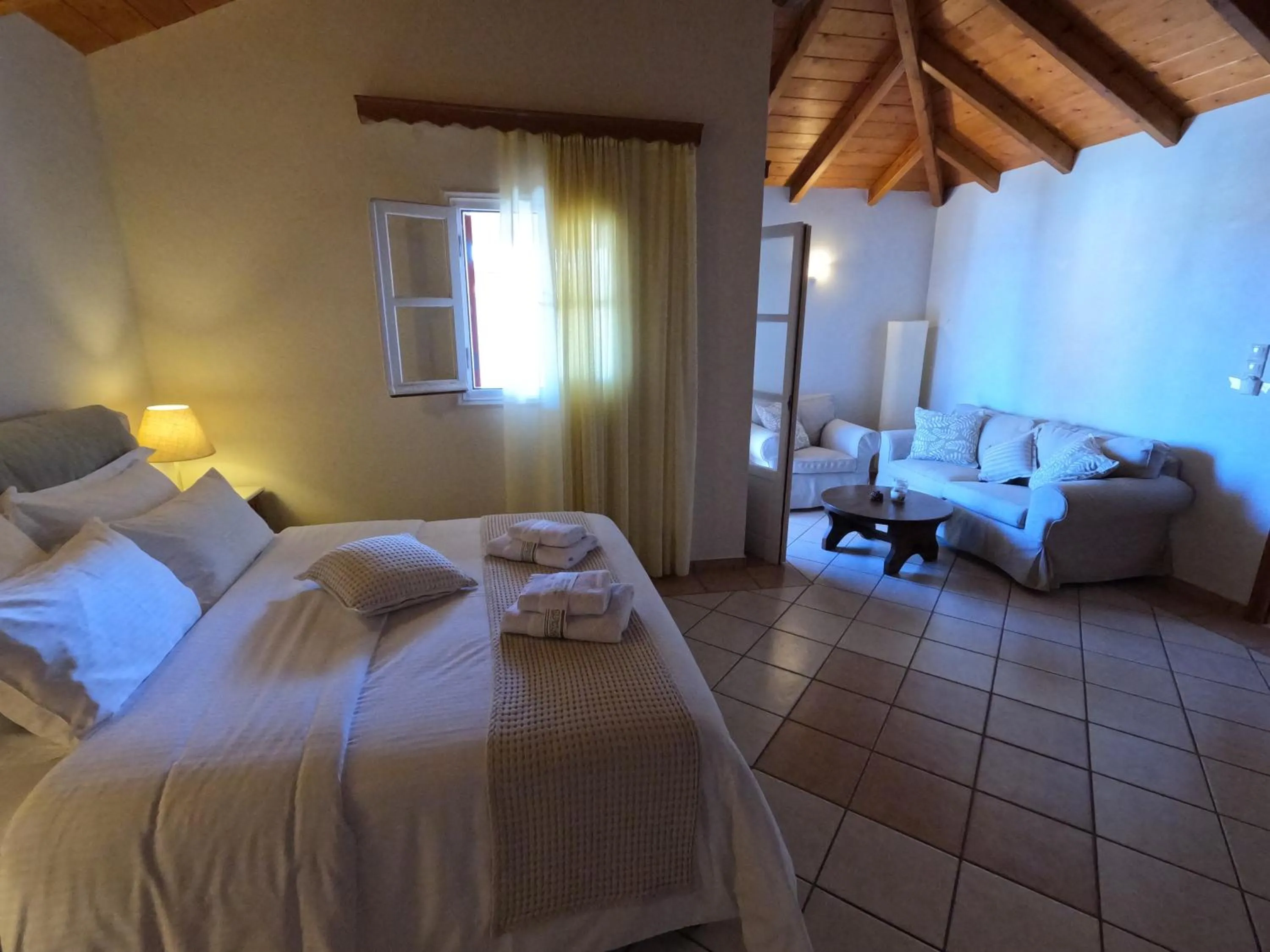 Bed in The Flower Of Monemvasia Hotel