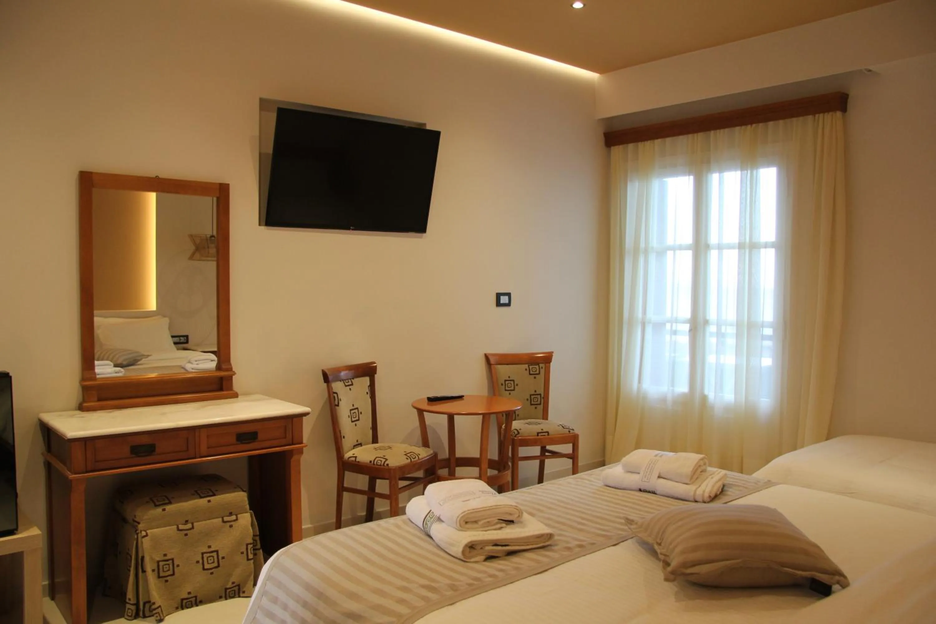 Bed in The Flower Of Monemvasia Hotel